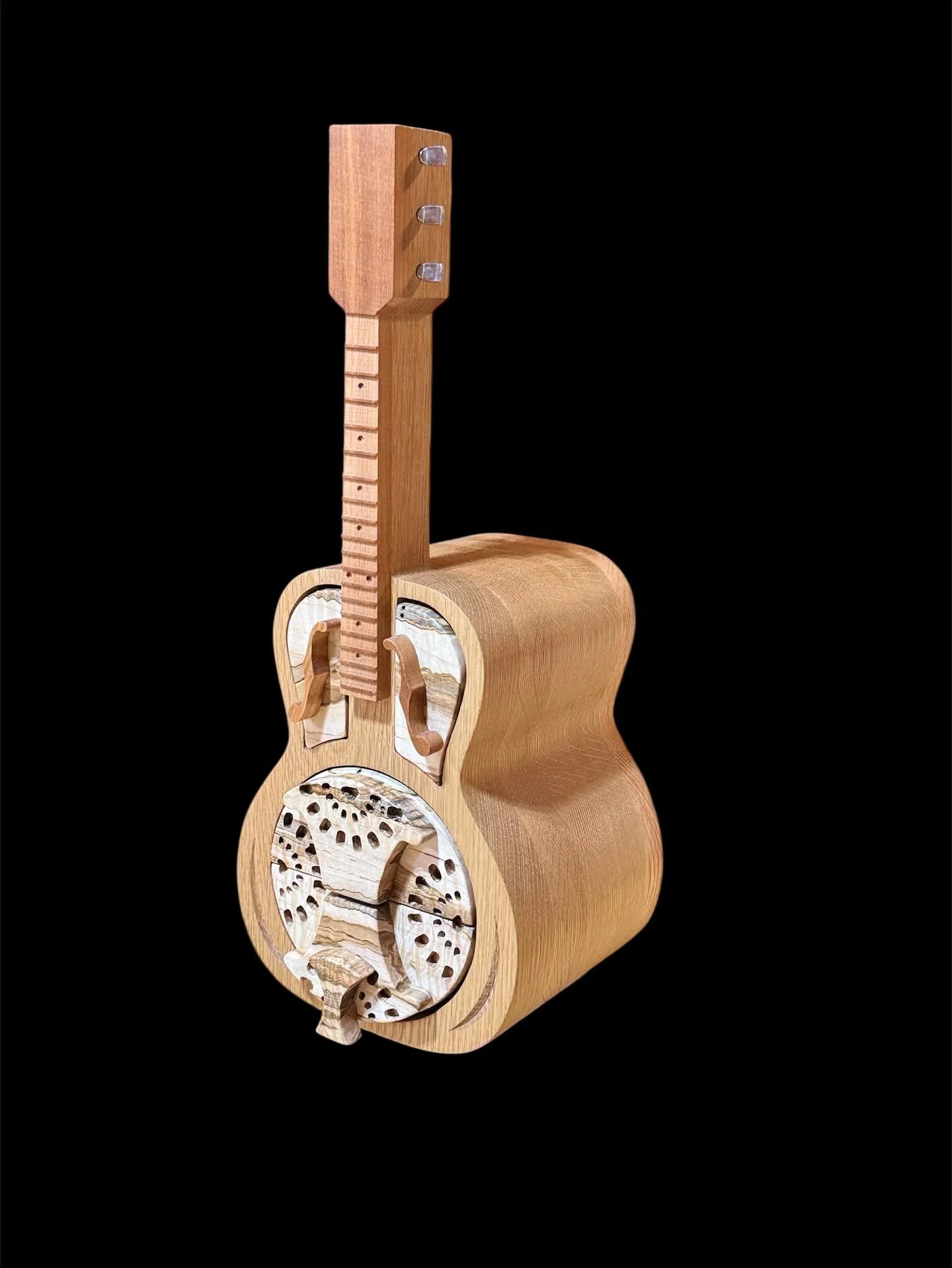 Check out this guitar jewelry box. Made from white oak, rustic maple, and cherry. Featuring four velvet lined drawers and a ready to personalize headstock. Available at www.boylewoodcraft.com .
#guitar #jewelrybox #guitarjewelrybox #woodworking #cus
