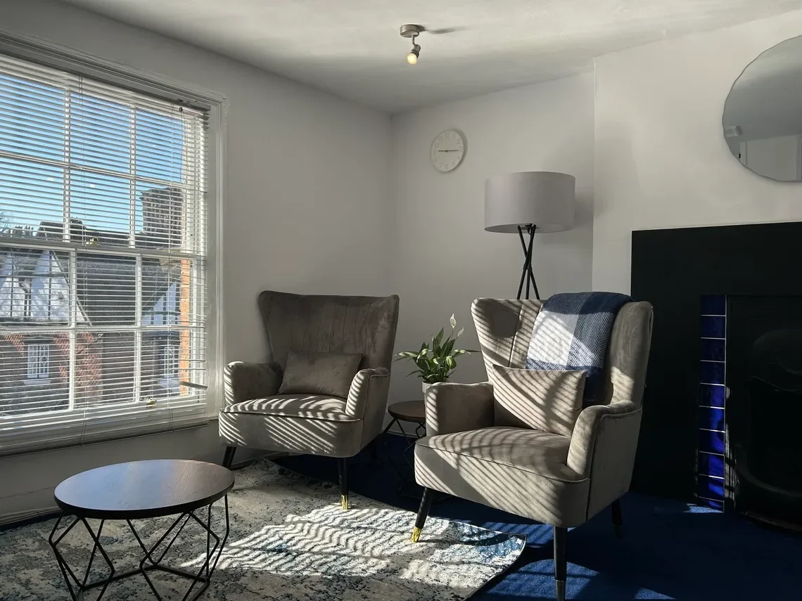Safe, confidential and cosy counselling room at The Therapy Nest in Tring, Hertfordshire. Peaceful, warm and relaxing counselling space.