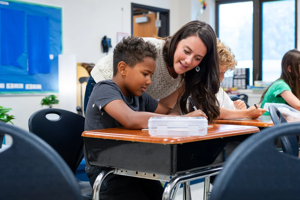 Teacher instructing students