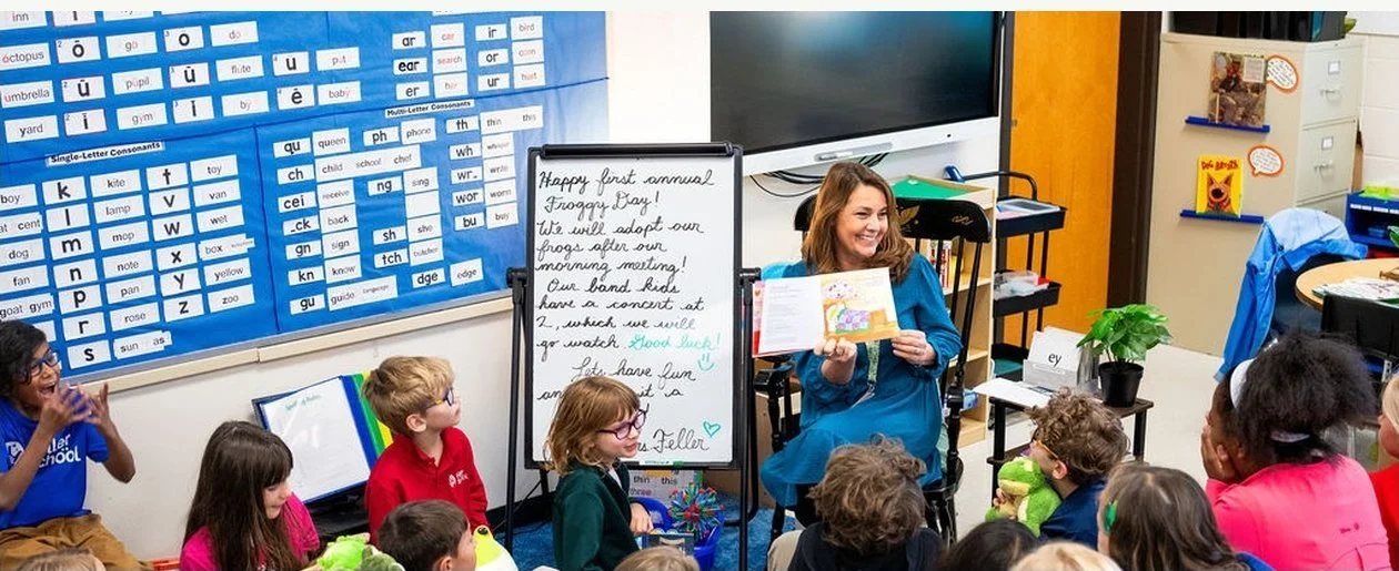Kim Feller with students in a Feller School classroom