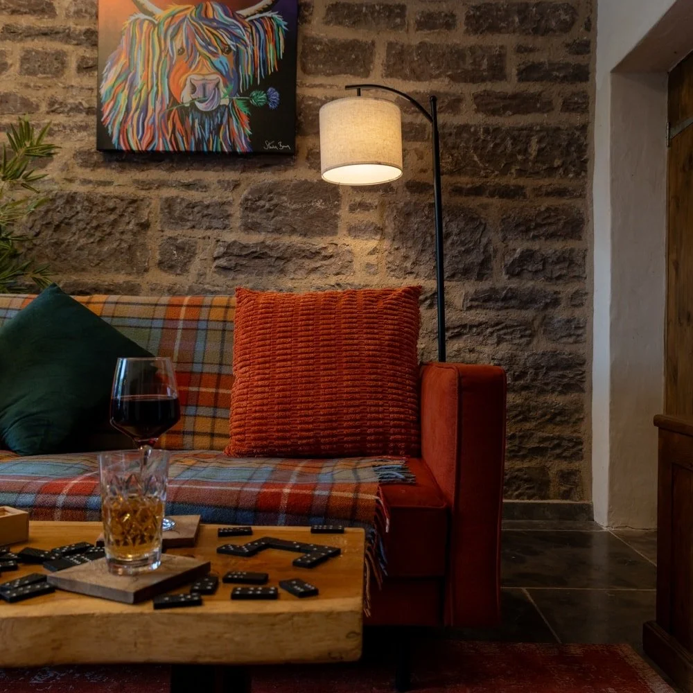 Settling in for the long haul 🛋
There's nothing better than this tartan-accented sofa, a highly competitive game of Scrabble, and a smooth glass of local Scotch whiskey 🥃
 Cheers to quiet moments and quality time with your favourite person 🥂

Pure