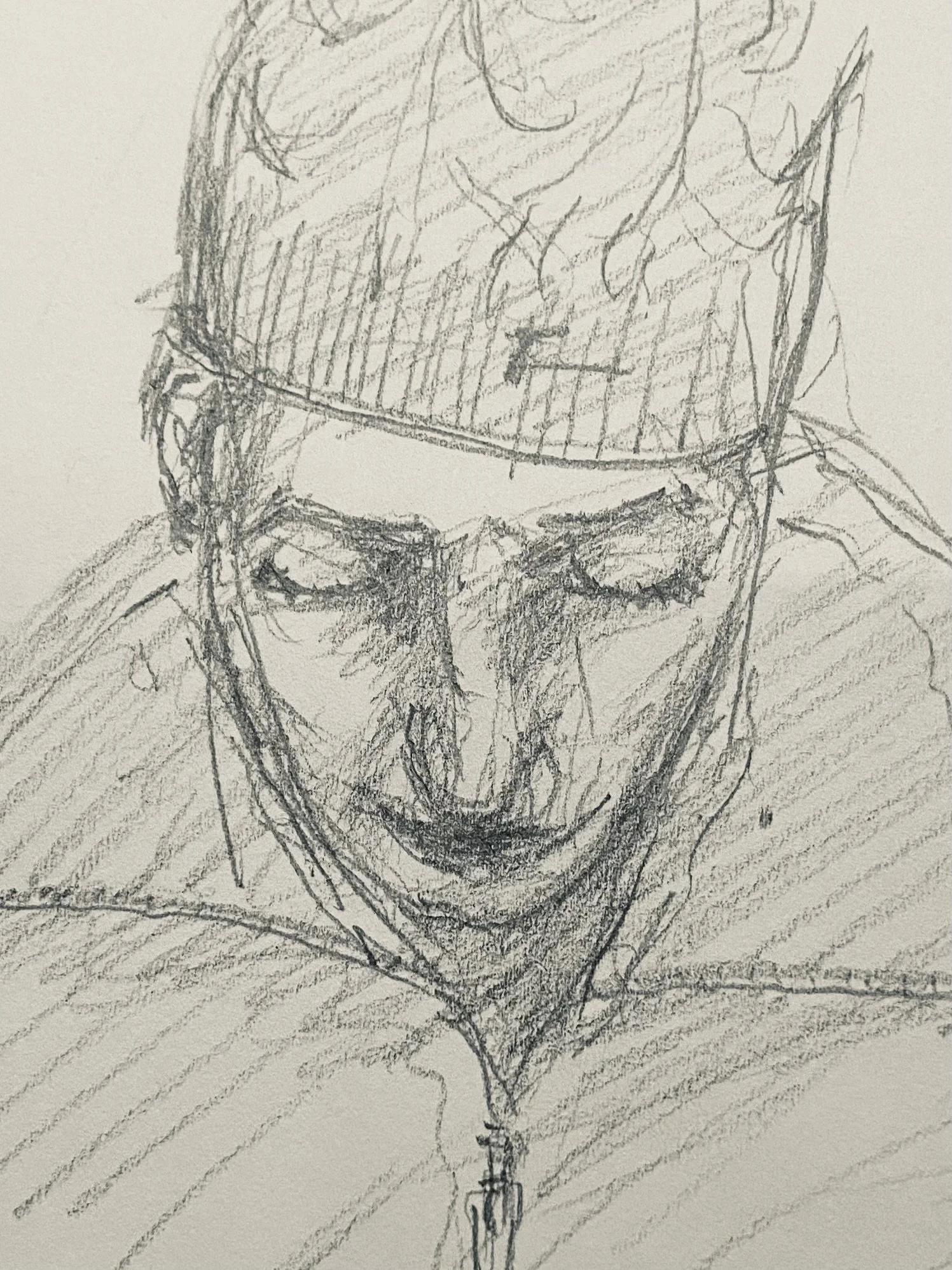 Pencil portrait of the writer wearing her knit hat, necklace, and pendant, with her head lowered and eyes closed, recovered from a private sketchbook and dated December 25, 2020.