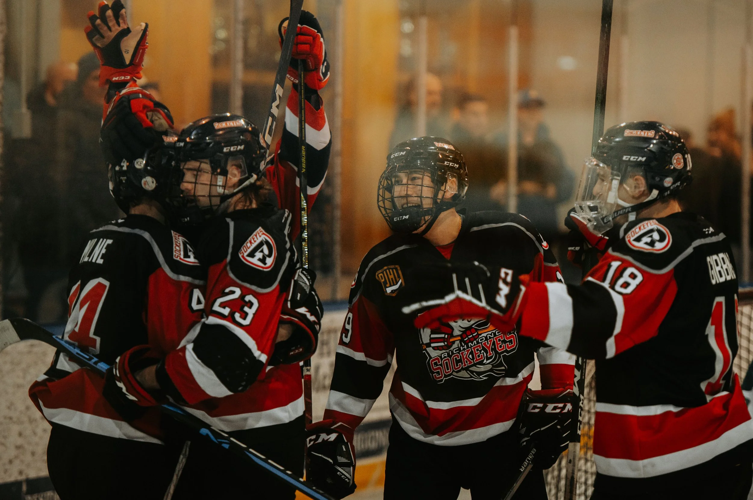 Hockey players competing in a high-pressure game environment
