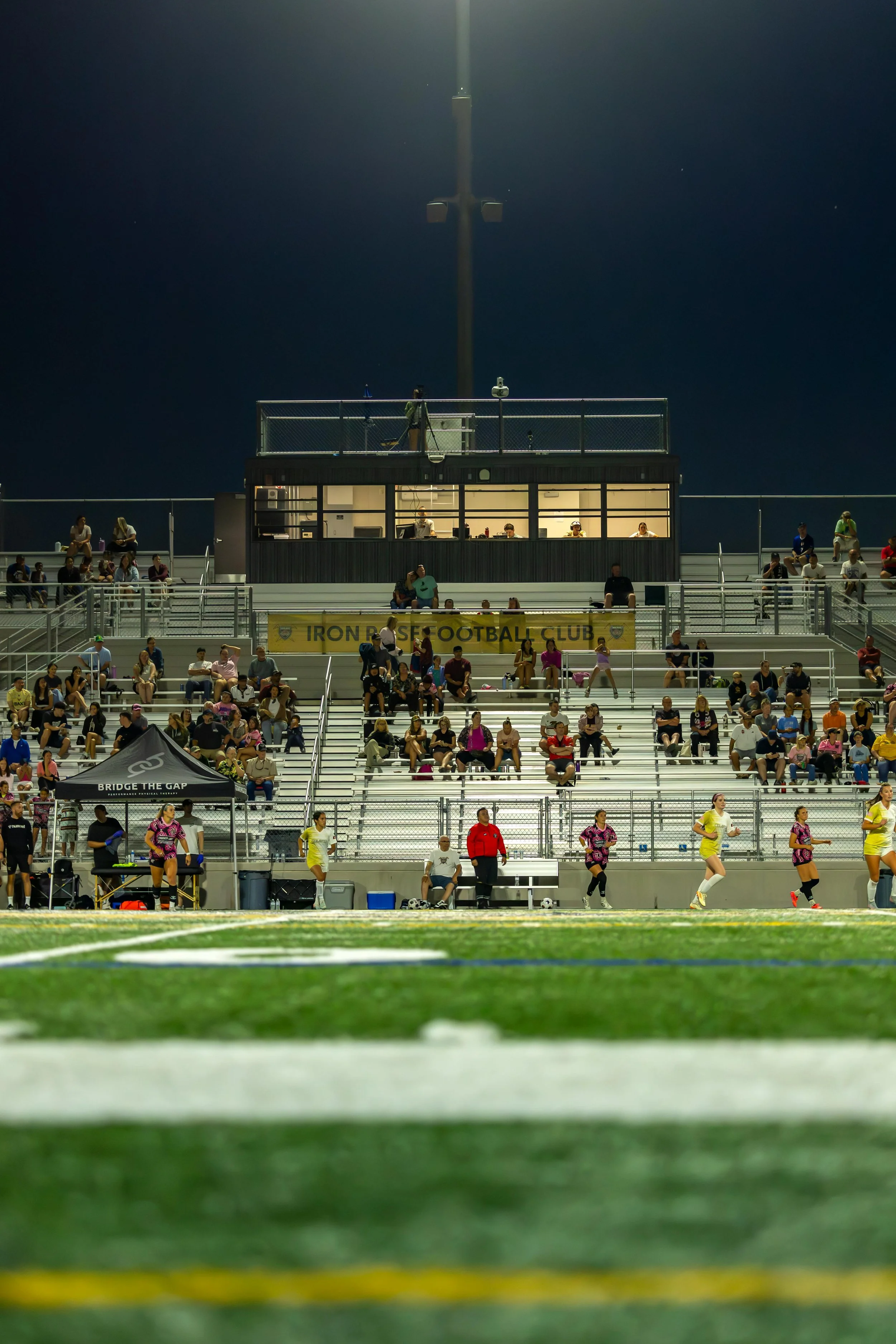 Soccer field representing competitive athletic performance