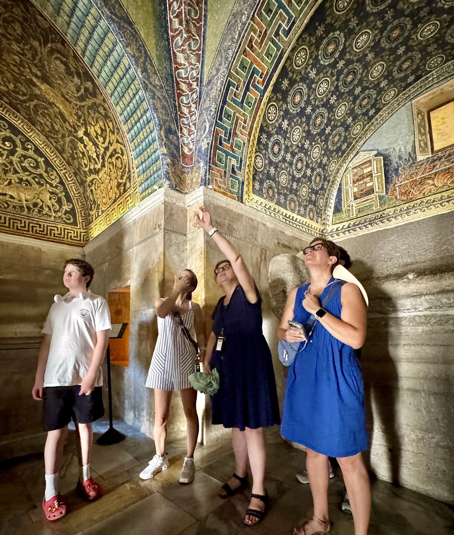 Tour guide, Sabrina, points out the 5th century mosaics in the Mausoleum of Galla Placidia