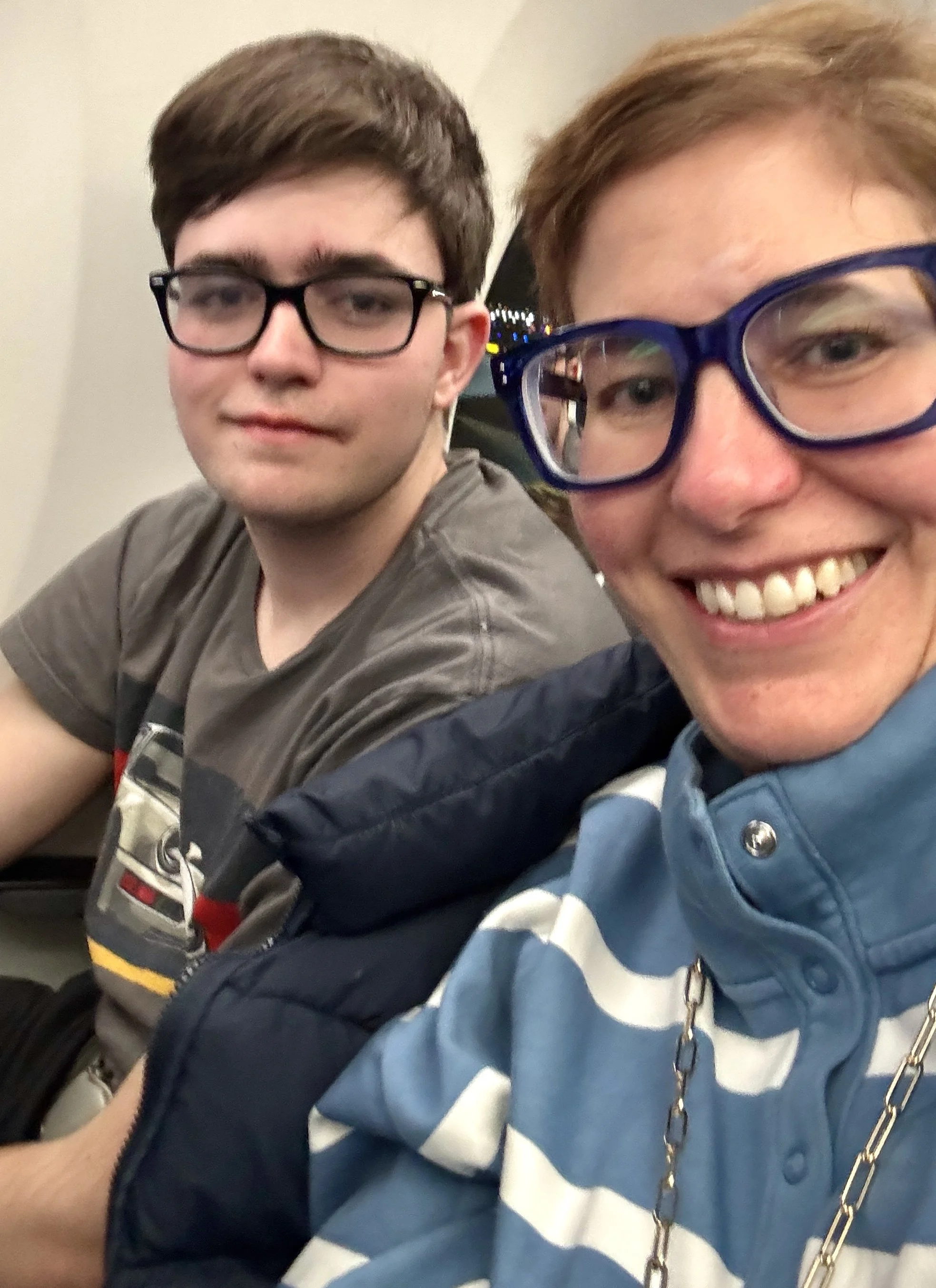 Mother and son on a night flight to Germany