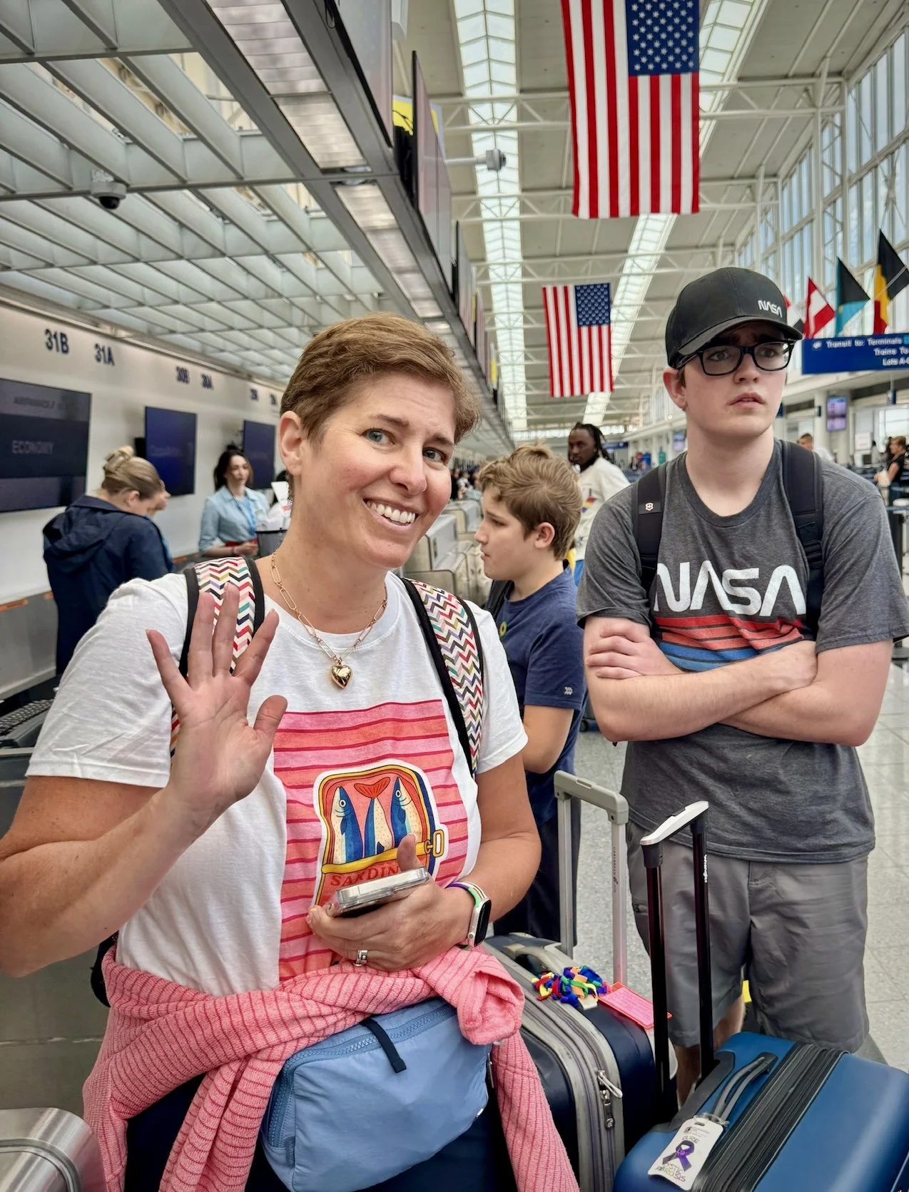Laura and her son waiting at O'Hare for their flight