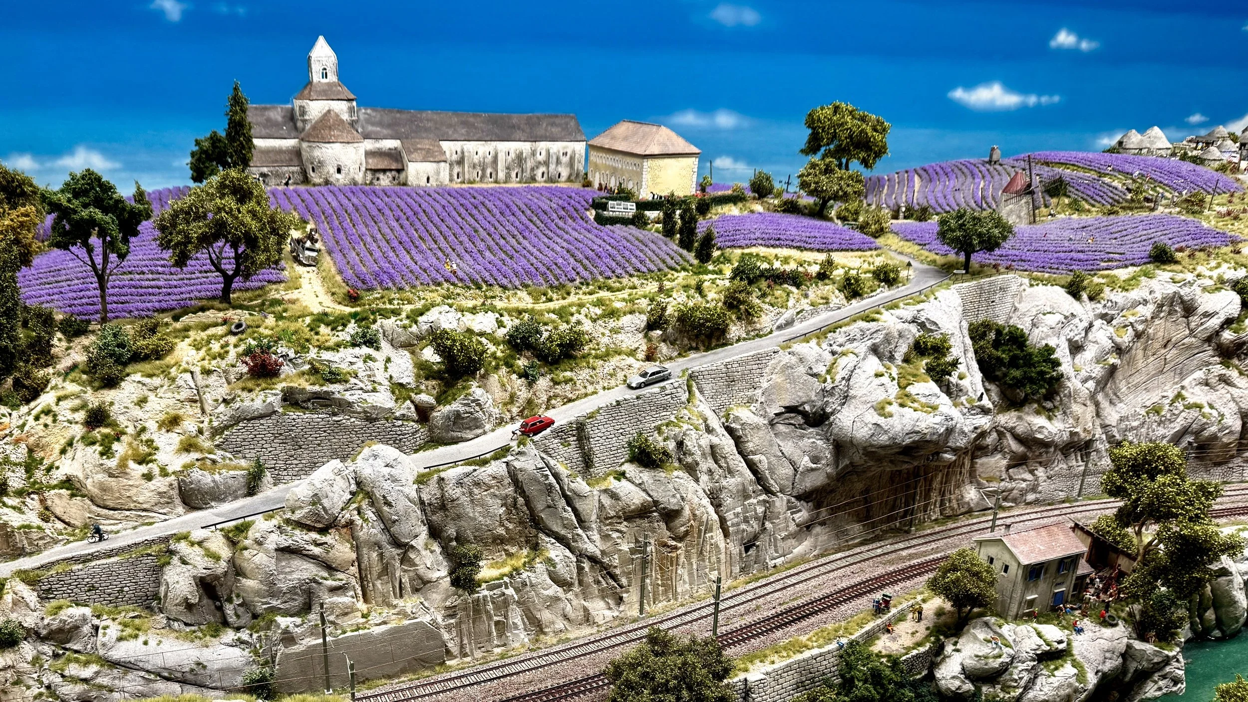 Miniature recreation of Abbey Notre-Dame de Sénanque surrounded by lavender fields in the Provence section of Miniatur Wunderland in Hamburg, Germany.