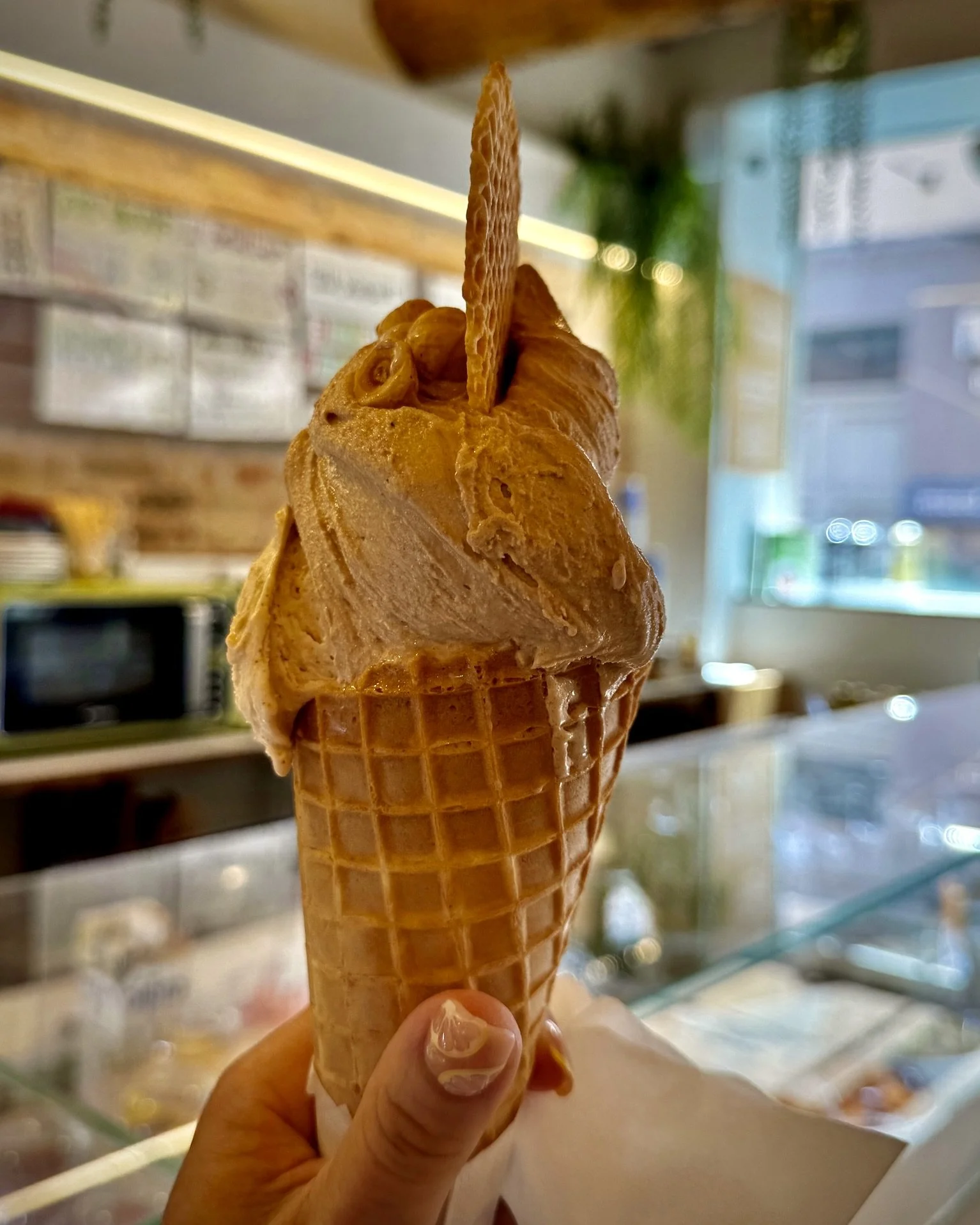 Yummy gelato in a waffle cone at Puro & Bio in Ravenna, Italy