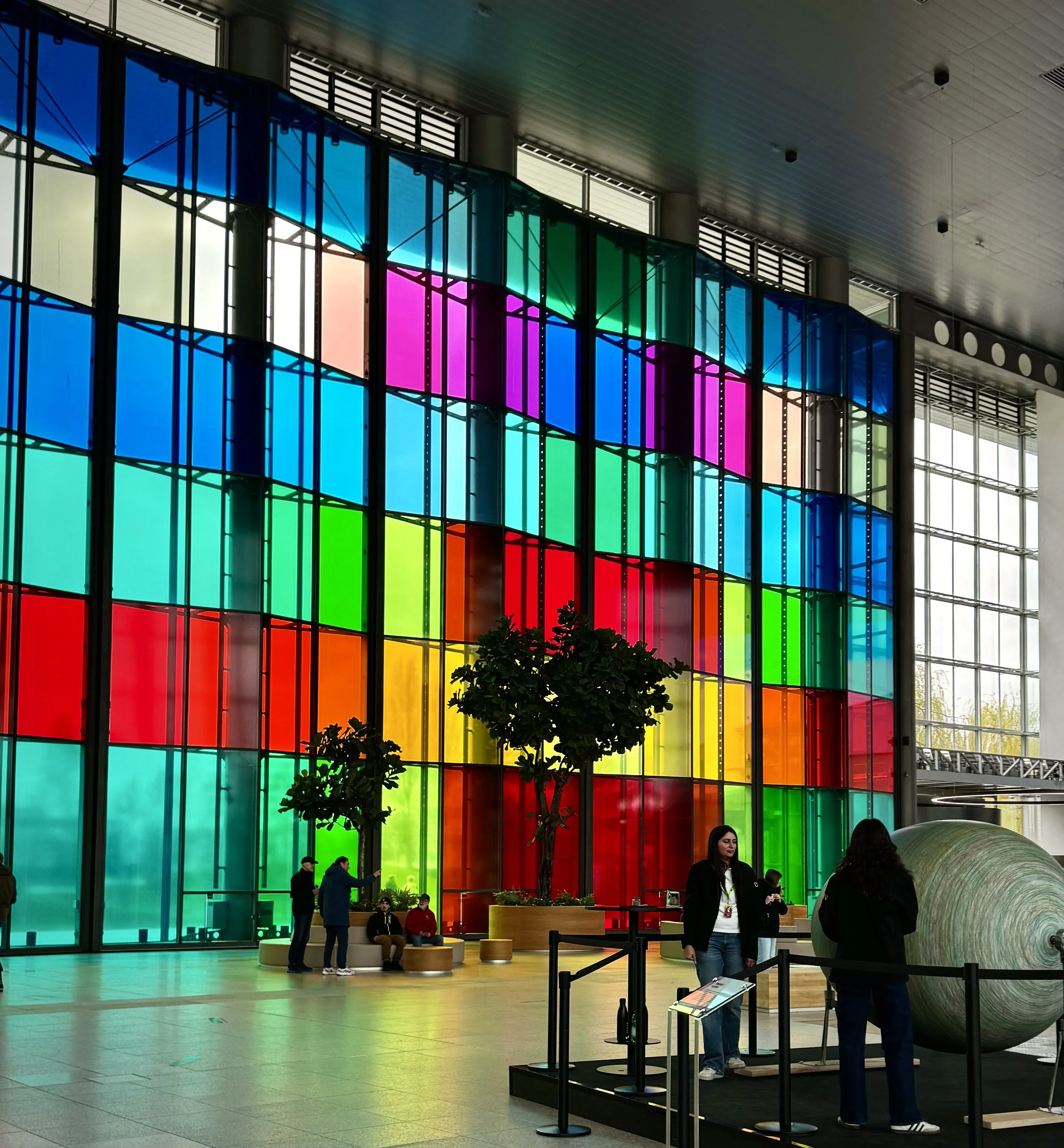 Colorful glass architecture inside Volkswagen's Autostadt automotive theme park and museum in Wolfsburg, Germany.