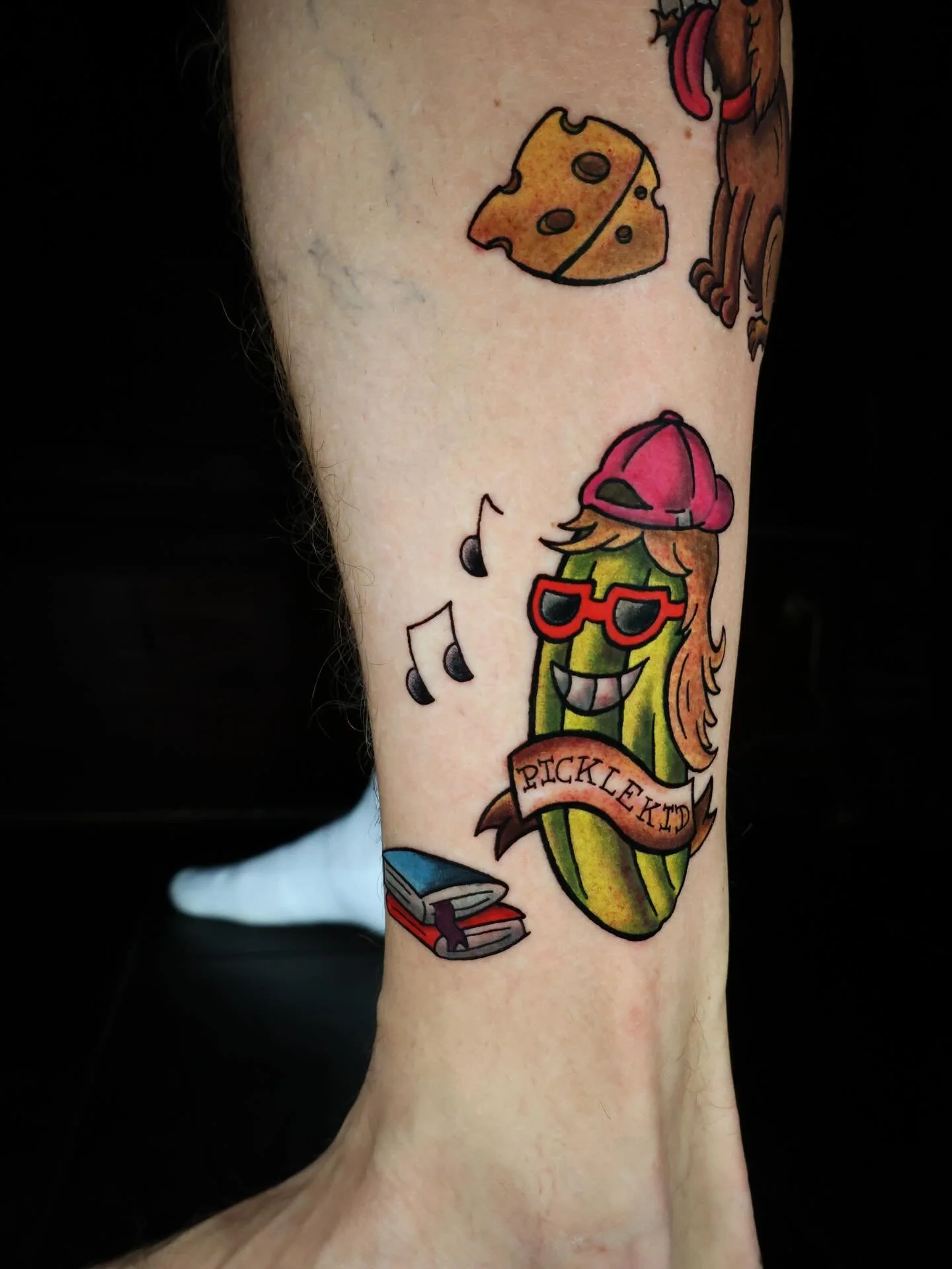 Pickle Kid &amp; Her Trusty Sidekick Roo 🥒

When @mk.1rob told me that my weird sketches he had seen knocking around the studio inspired him to draw up some of his own ideas, we just knew they needed tattooing.

One sketch of his daughter as a pickl