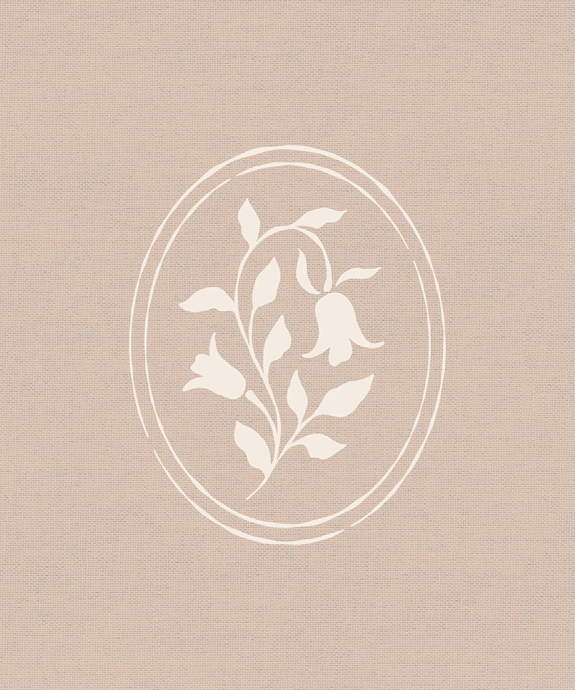 White floral design inside an oval frame on a beige textured background.
