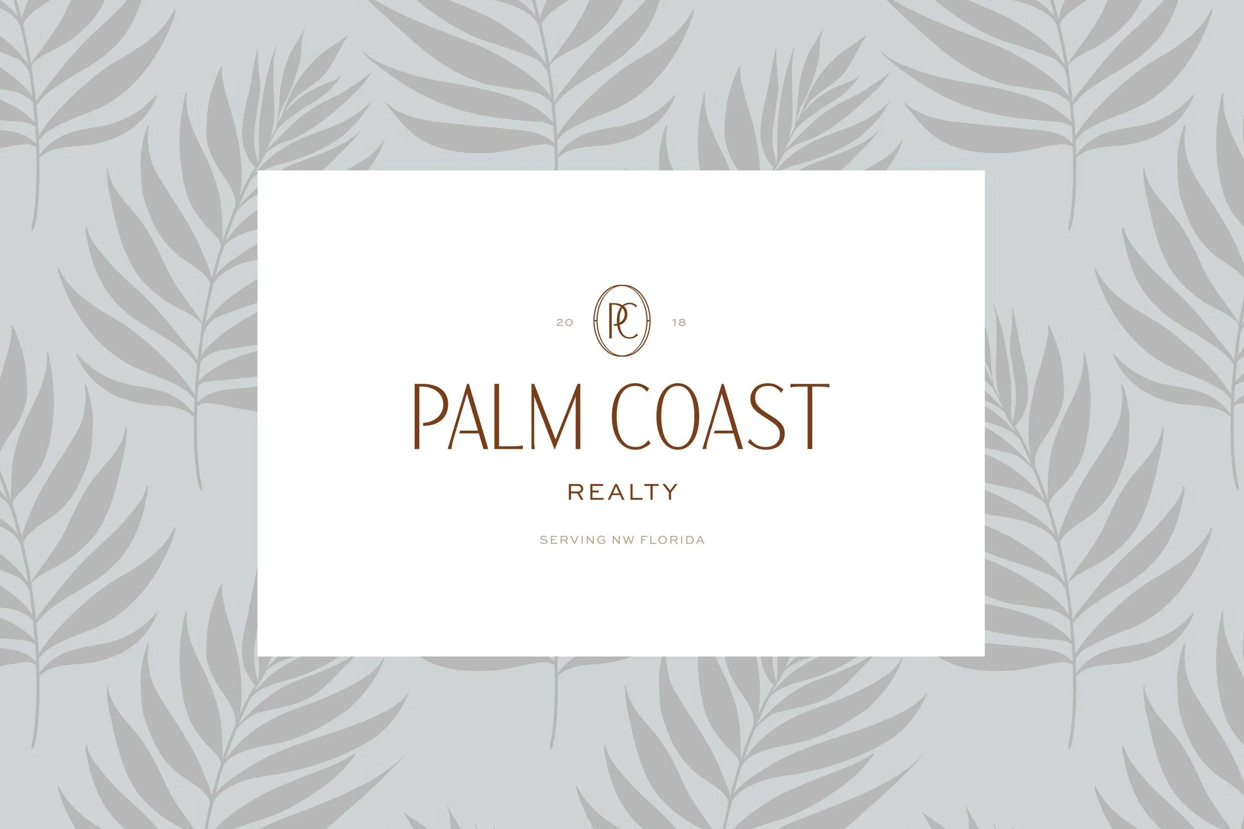 Palm Coast Realty logo on a white background with a light gray palm leaf pattern.