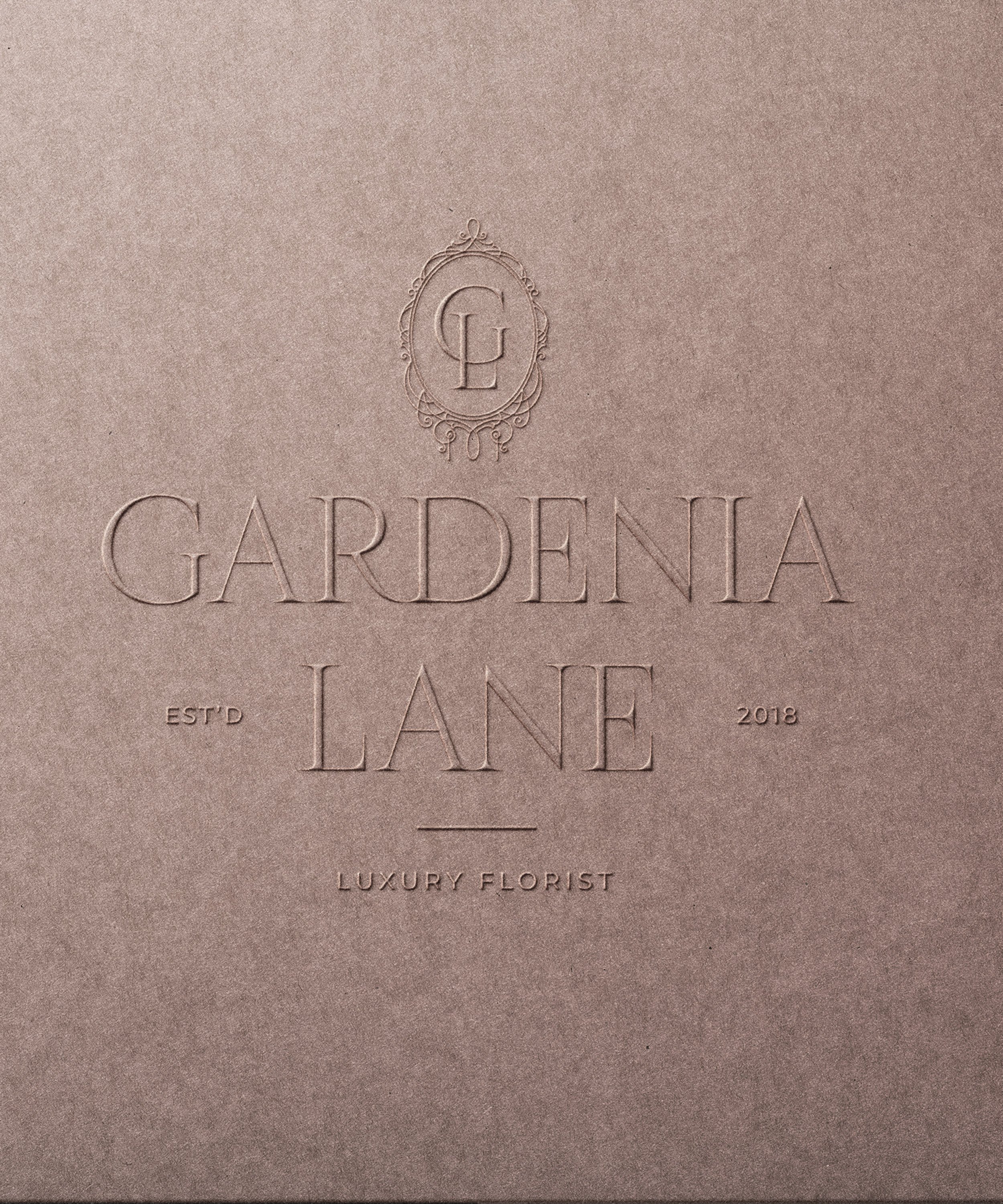 Luxury logo design featuring an ornate oval frame