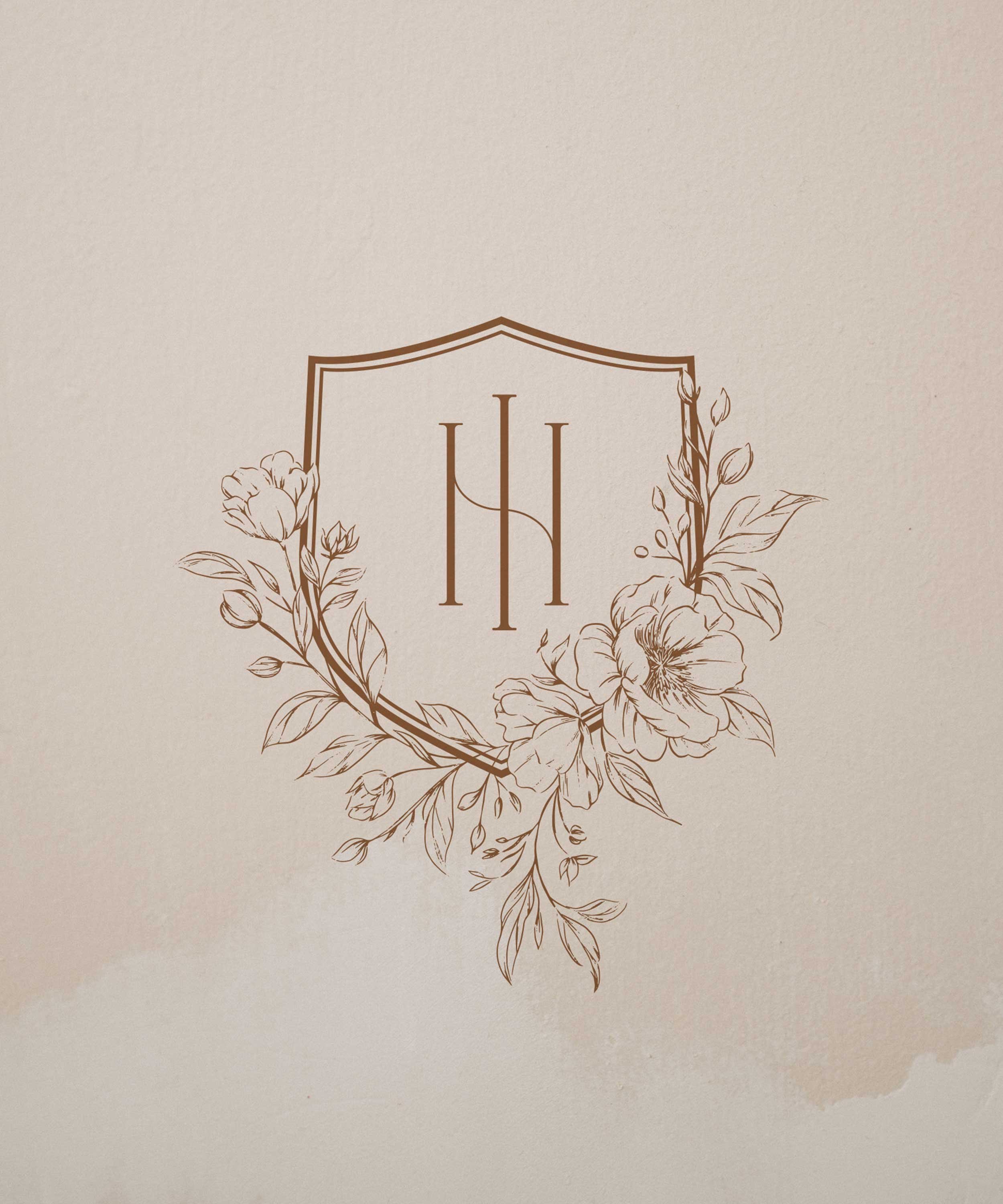 Elegant logo with intertwined monogram 'HN' inside a shield, surrounded by floral sketches, in brown on a beige textured background.