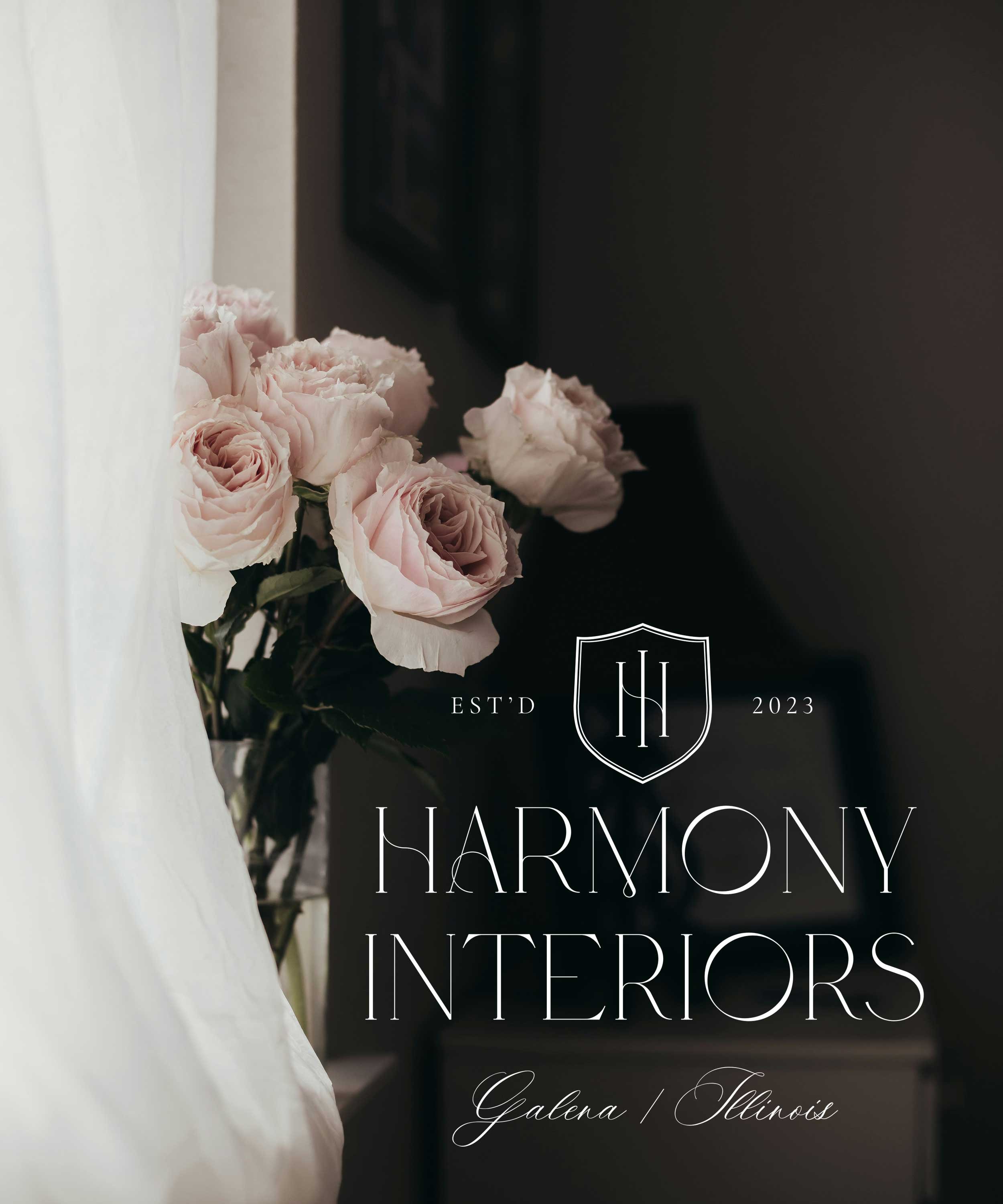 A bouquet of pale pink roses next to a white curtain, with text overlay for Harmony Interiors, established 2023, in Galena, Illinois.