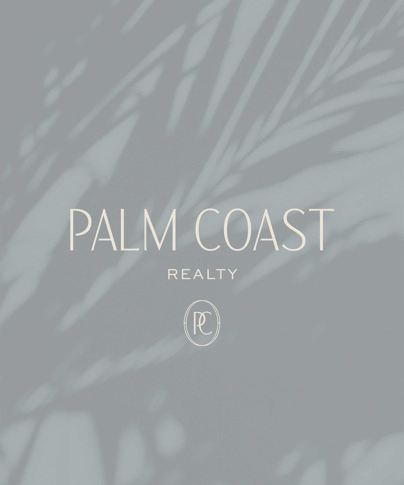 Gray overlay with faint palm leaf shadow, text that says 'Palm Coast Realty' and logo at the bottom.