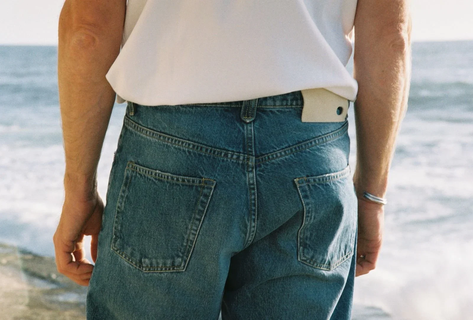 ESSENTIAL FOUNDATIONS. JEANS, WHITE-T. HANDMADE SHOES.