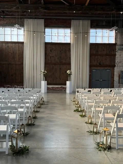 Ceremony Decor at Brick South witb floral pedestals.jpg