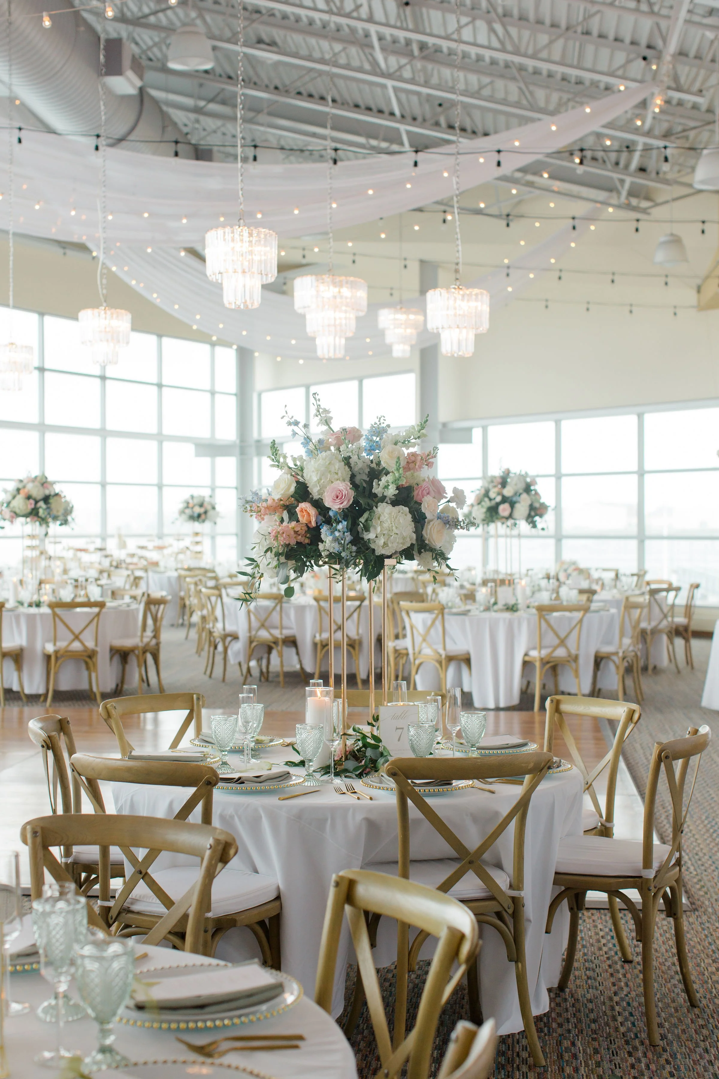 Ocean Gateway Crystal Prism Chandeliers with Ceiling Draping.jpg