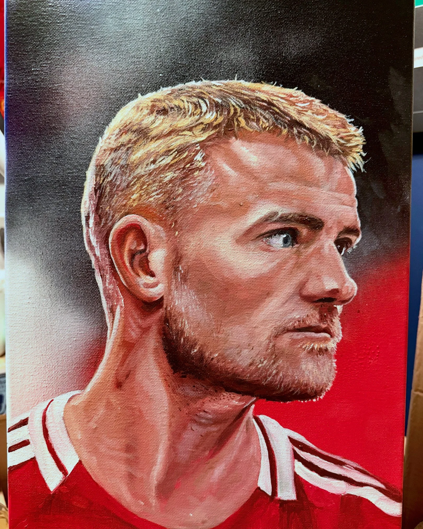 Side profile portrait of a footballer looking to the right