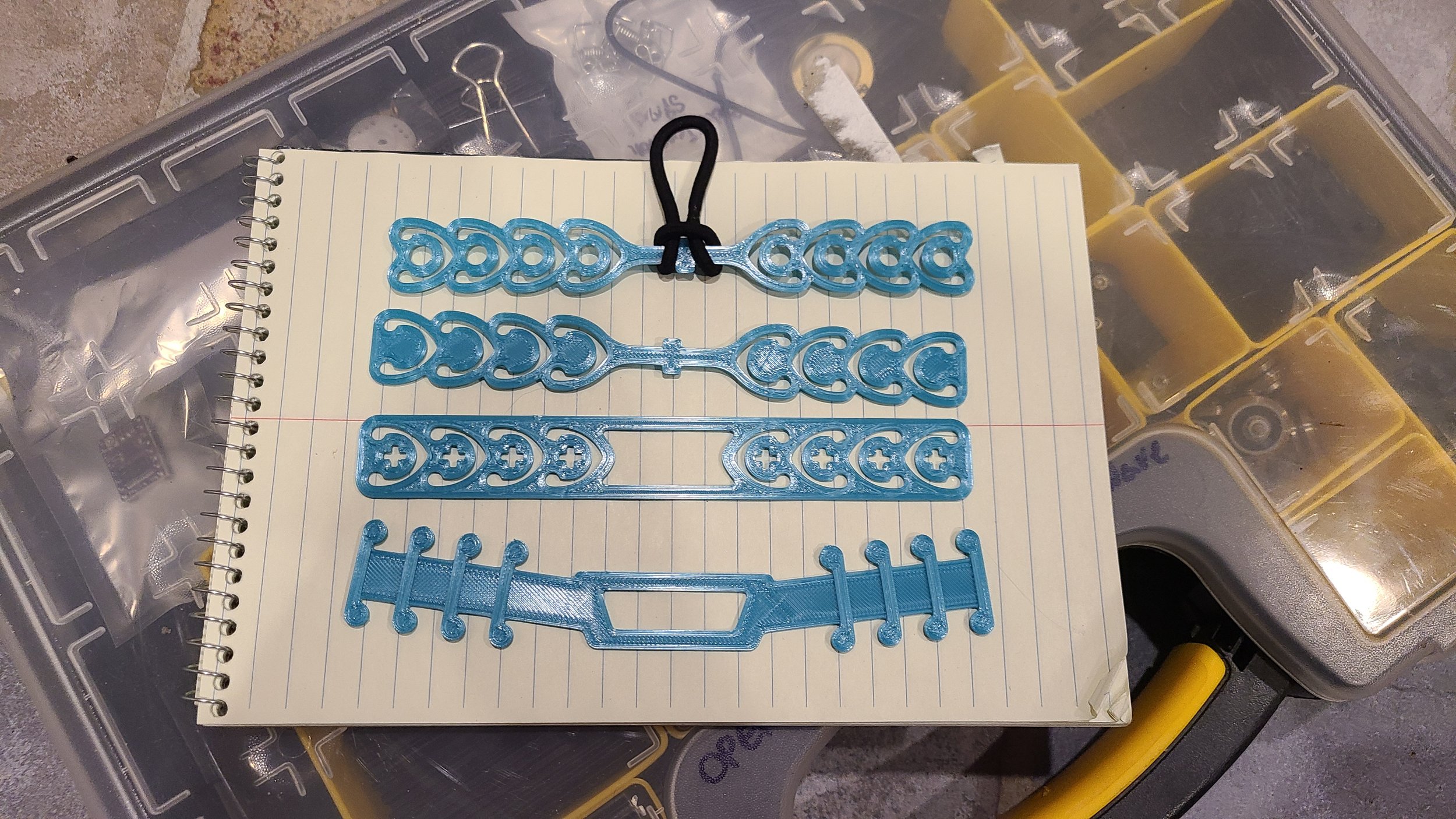Early iterations of the SeaMass Mask Adjuster, including the original pronged design that inspired SeaMass