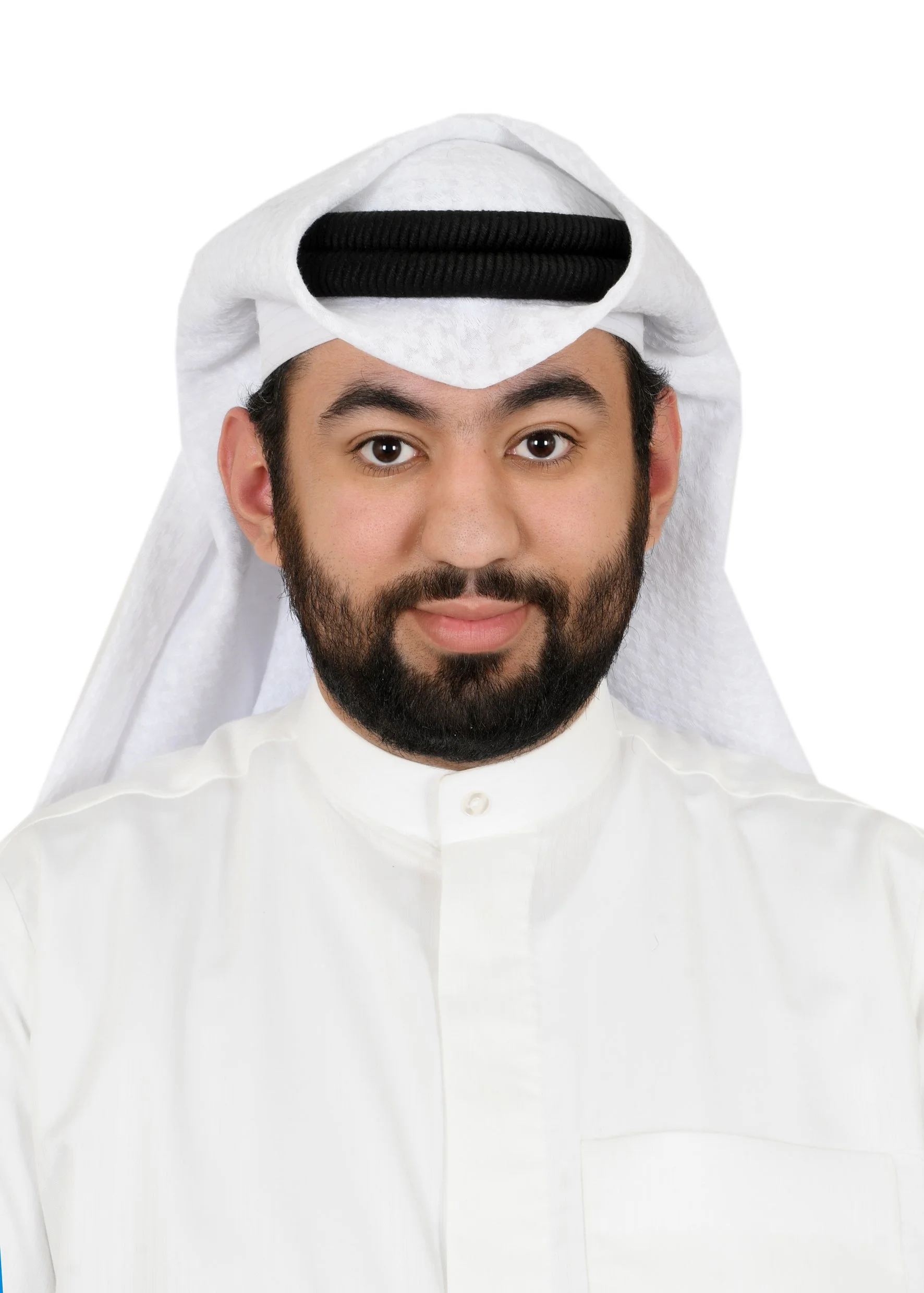 A man with a beard and mustache wearing traditional Middle Eastern attire, including a white kandura and a white ghutra with a black agal on top.
