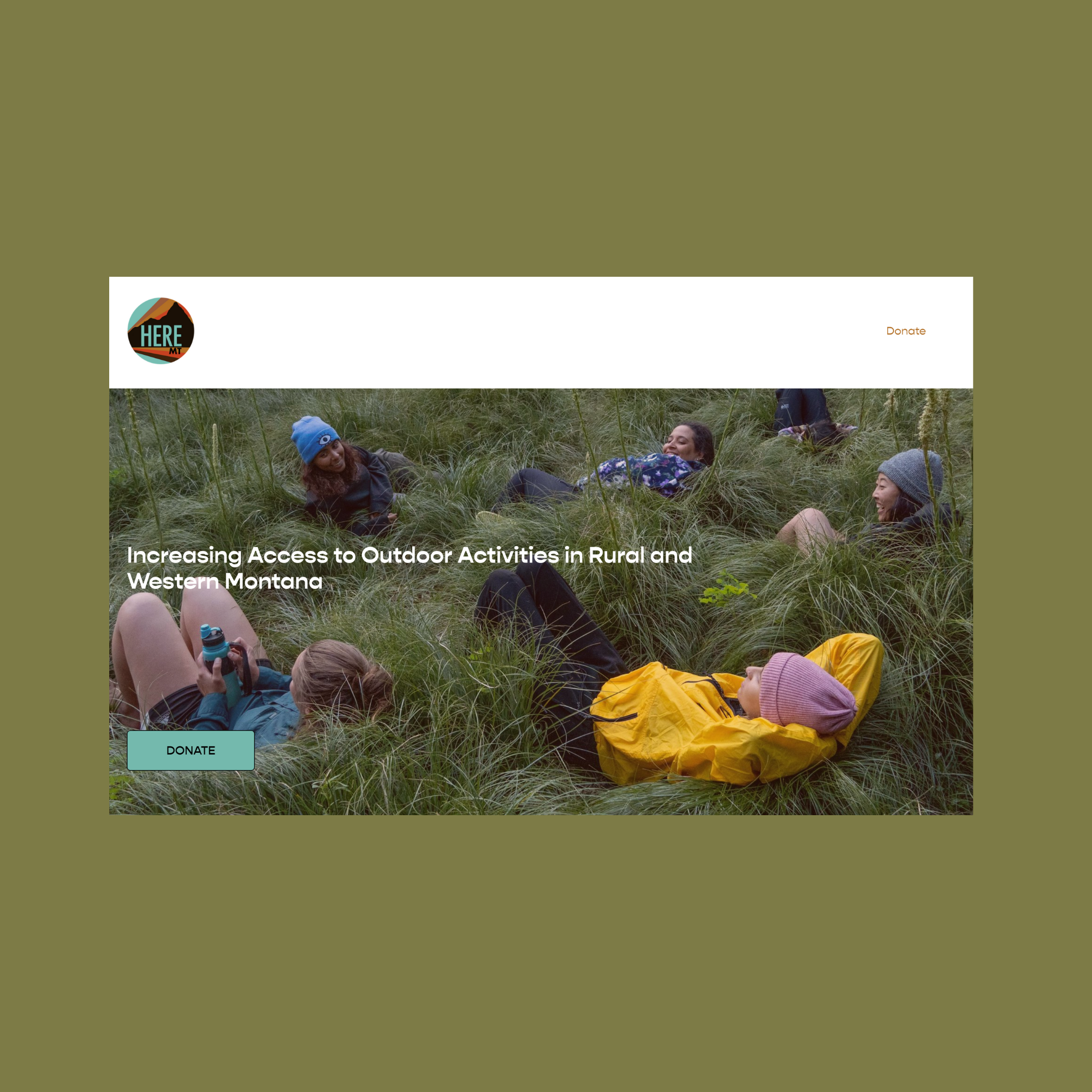 A group of people relaxing and chatting in tall grass outdoors, some lying down and some sitting with backpacks, in a natural setting.