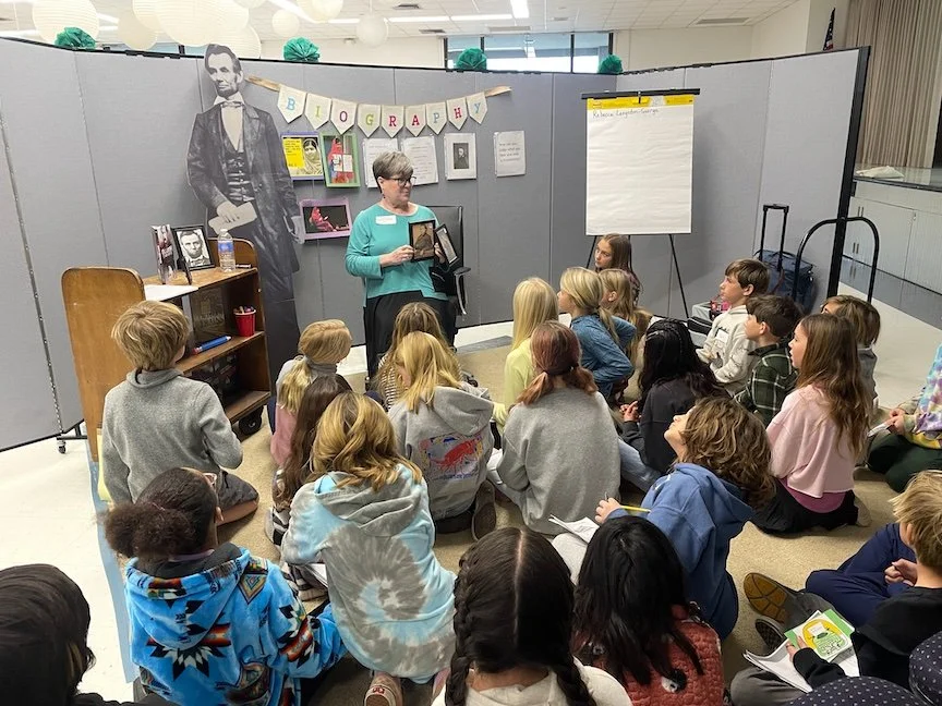 Rebecca presenting to a classroom about biographies