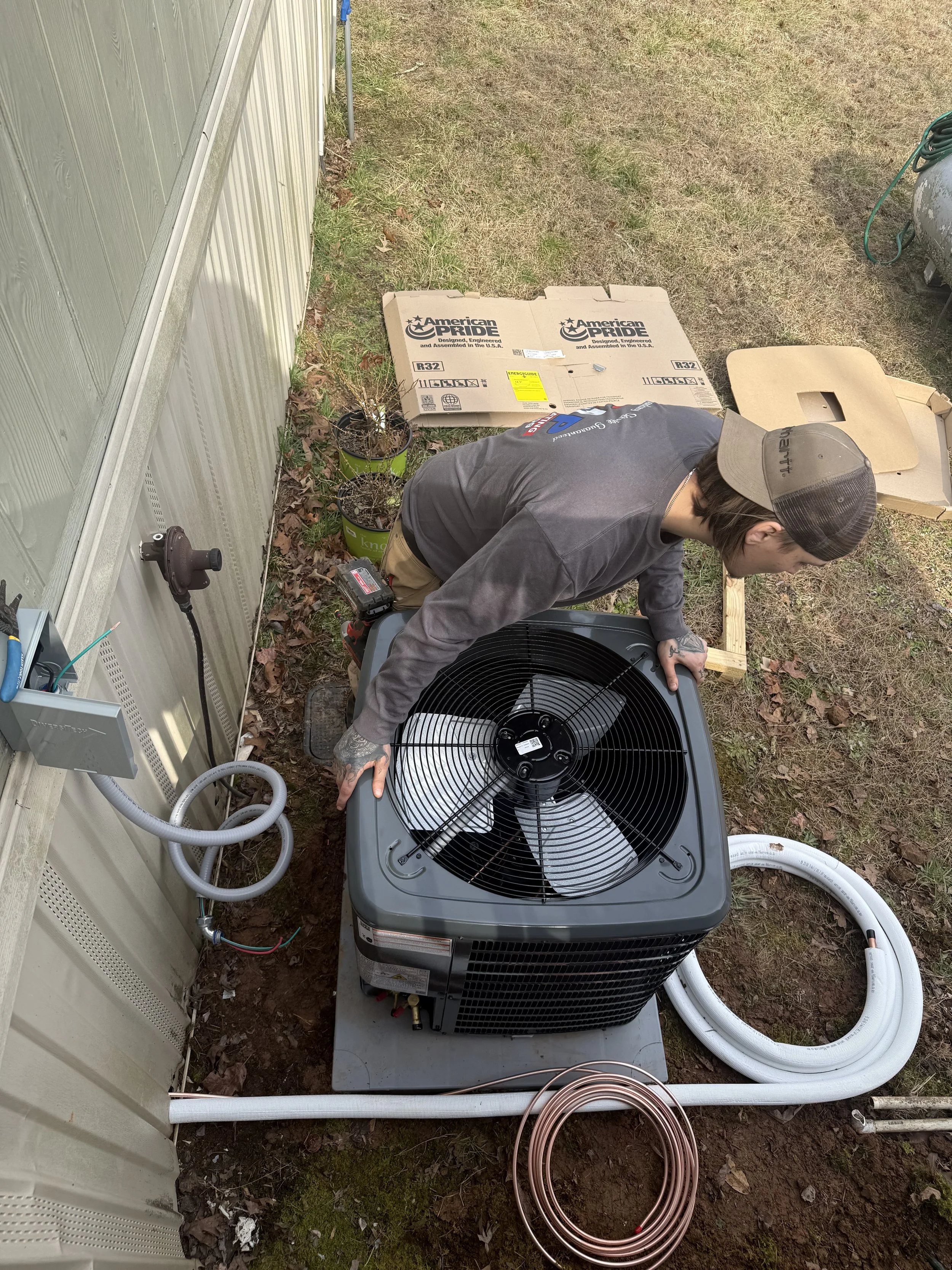 Tech Checking HVAC Unit