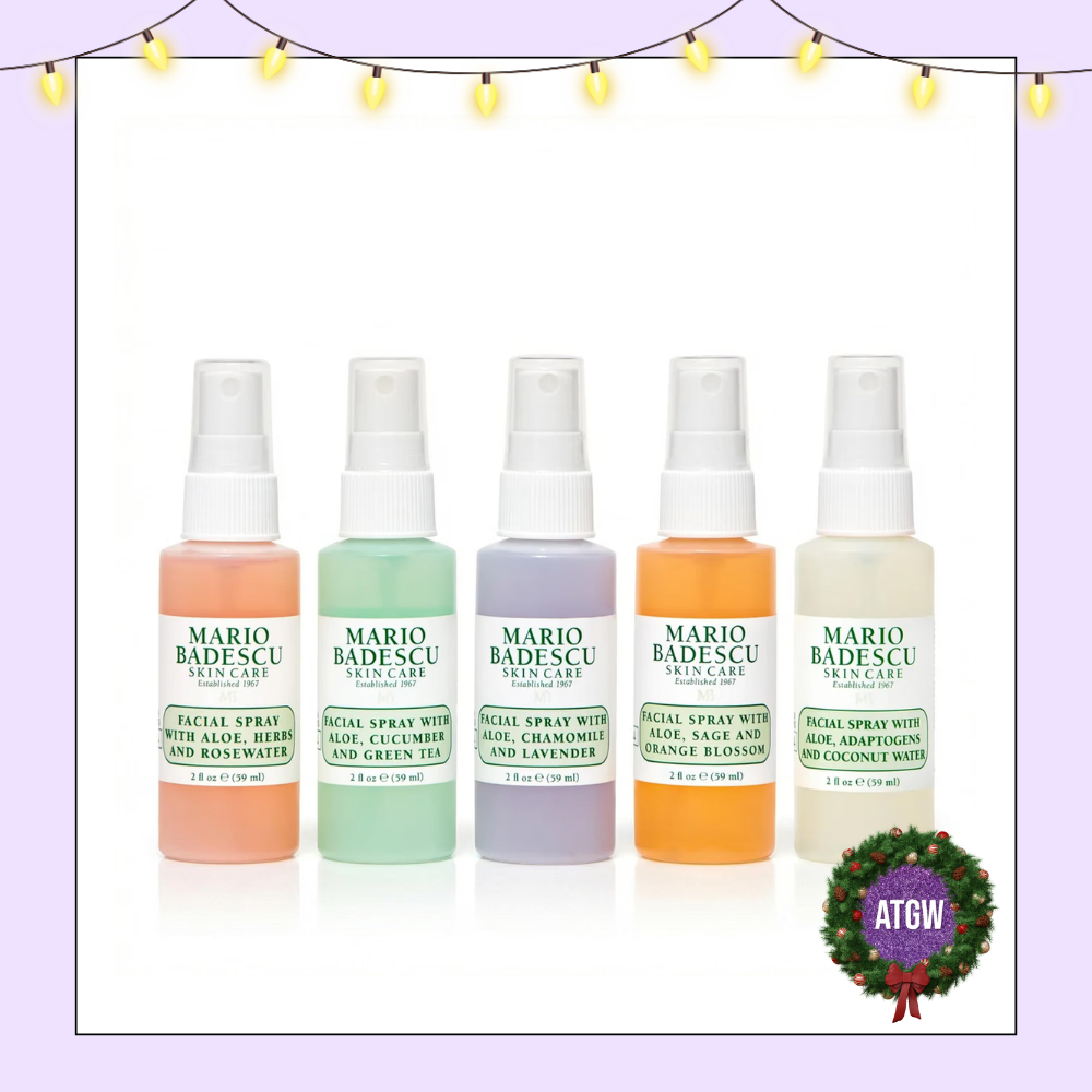 Five mini Mario Badescu facial spray bottles in pink, green, purple, orange, and white lined up side-by-side.