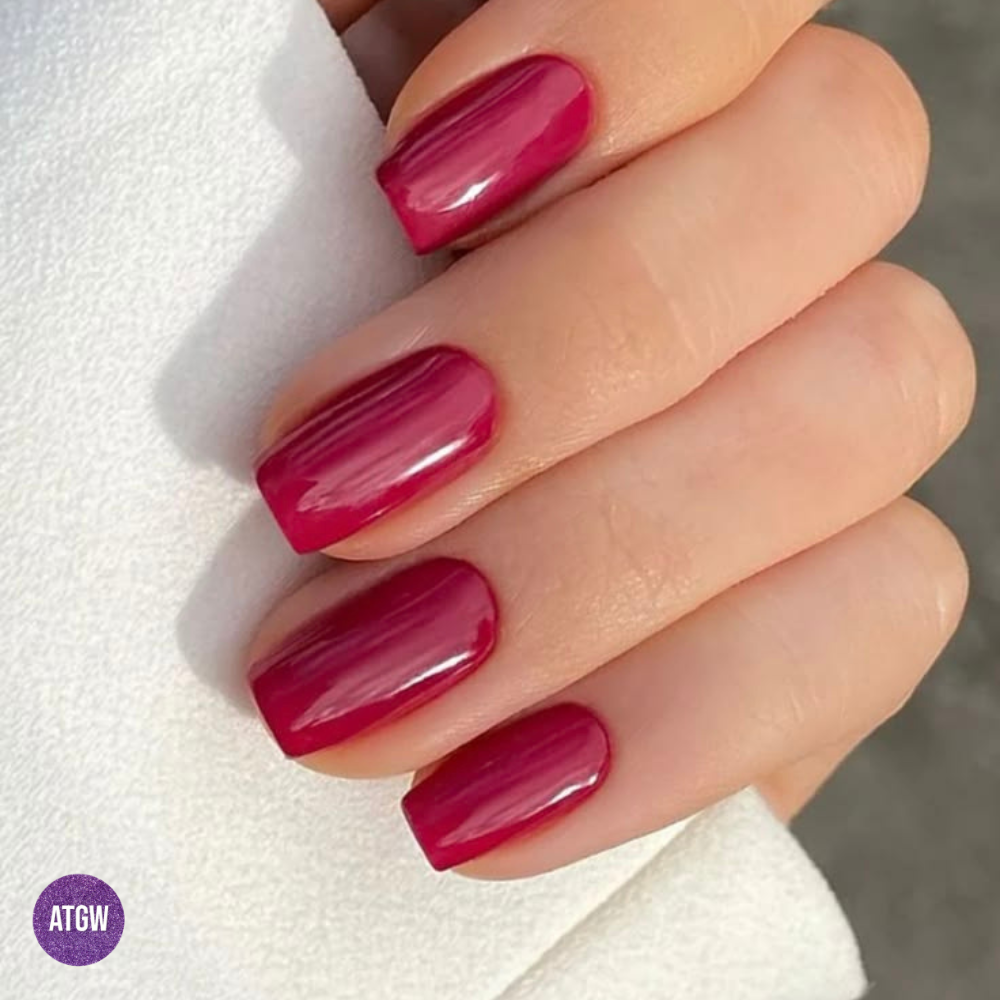 Magenta nail polish.