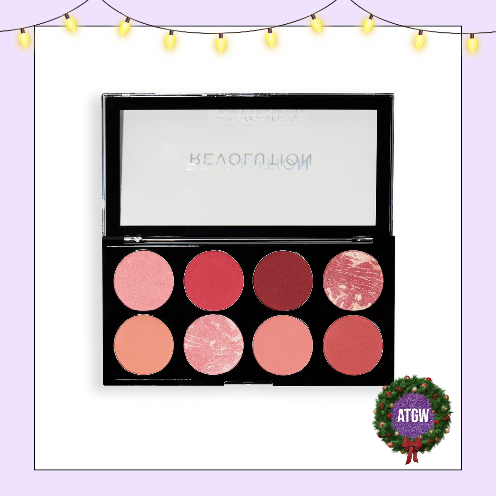 Open Makeup Revolution Ultra Blush Palette displaying eight shades of pink and rose blushes in a black compact.