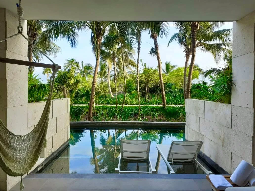 Since I am stuck at home in a snowstorm right now.. let's talk about some place warm!

One resort that consistently stands out for my clients looking for an adults-only escape in Cancun is Live Aqua Beach Resort Cancun.

This resort is known for its 