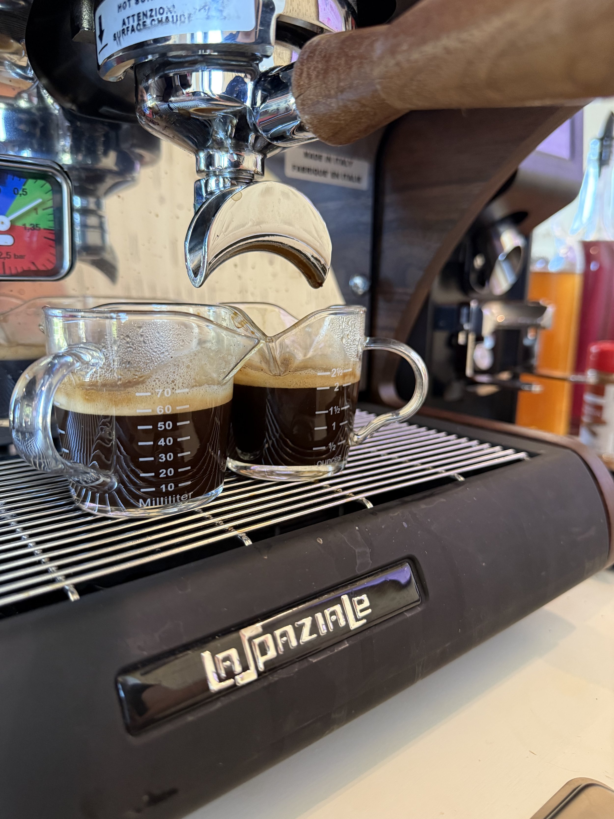 Custom coffee cart catering espresso shot pulling