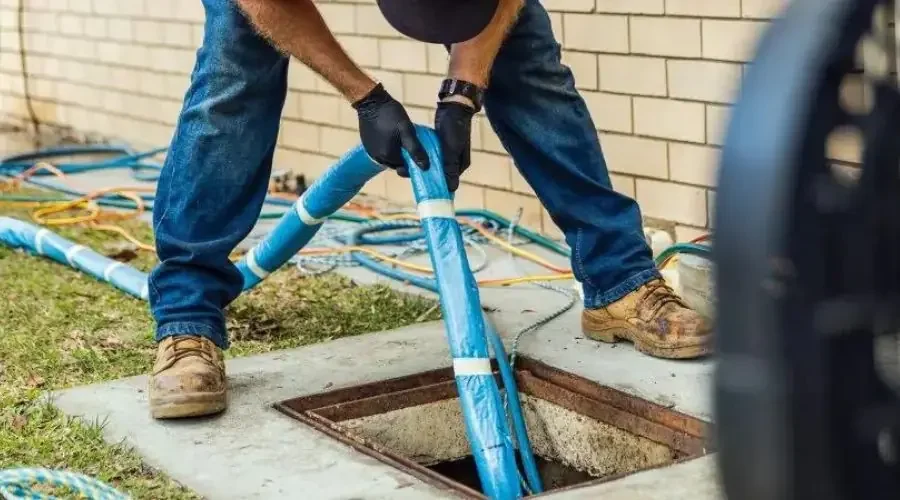 Professional plumber in broomfield colorado repairing trenchless sewer.