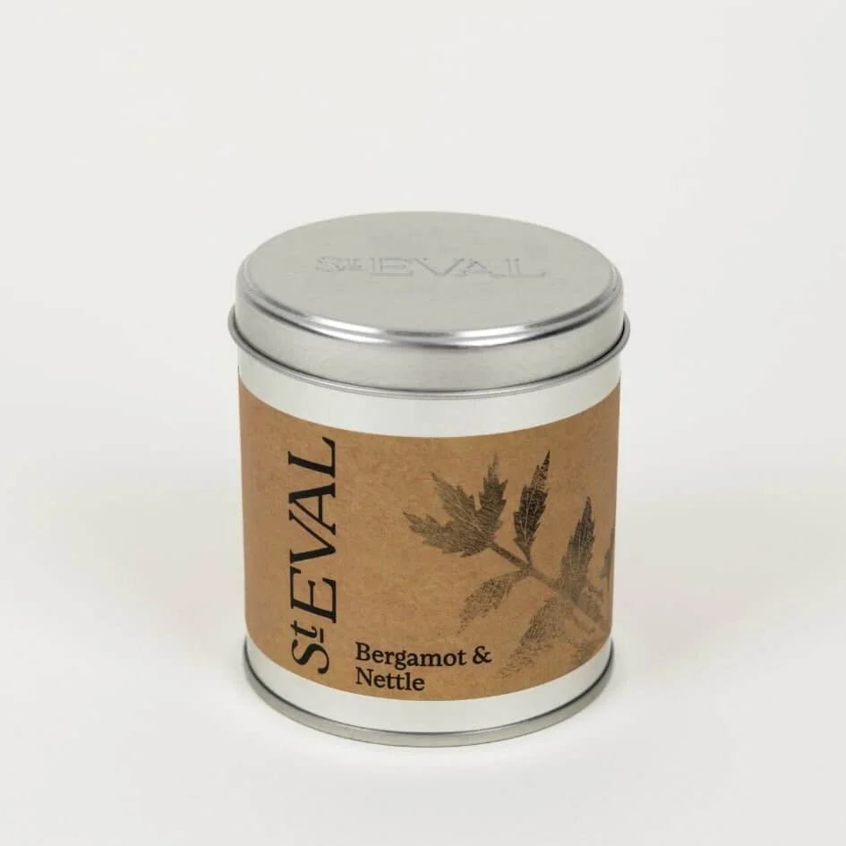 St. Eval Bergamot & Nettle candle with embossed silver lid and Kraft label.