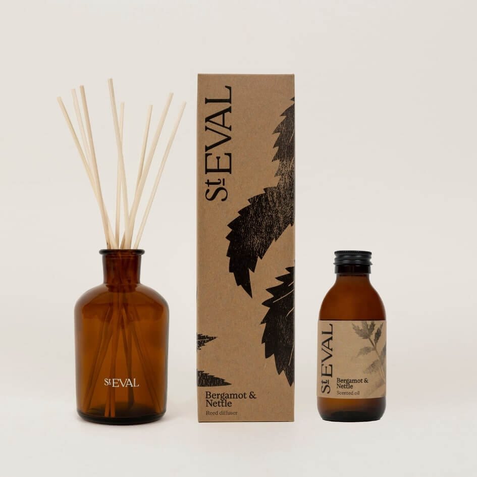 St. Eval Bergamot & Nettle reed diffuser set with scented oil and natural rattan reeds in amber glass bottle – luxury home fragrance.