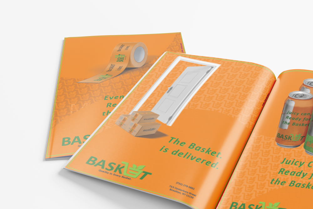 Open magazine on orange showing a white basket, Basket packaging and canned juice — “The Basket is delivered.”