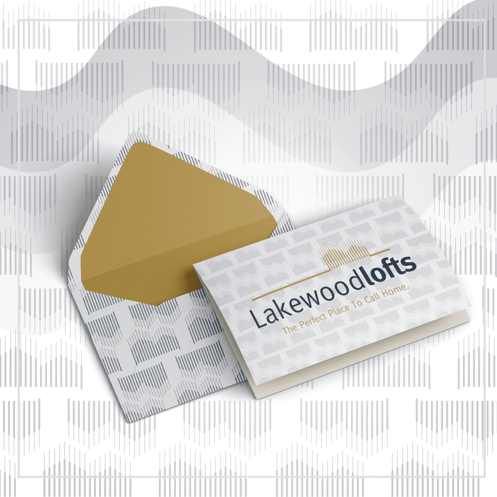 Lakewood Lofts business card with the slogan “The Perfect Place To Call Home” on the brand pattern.