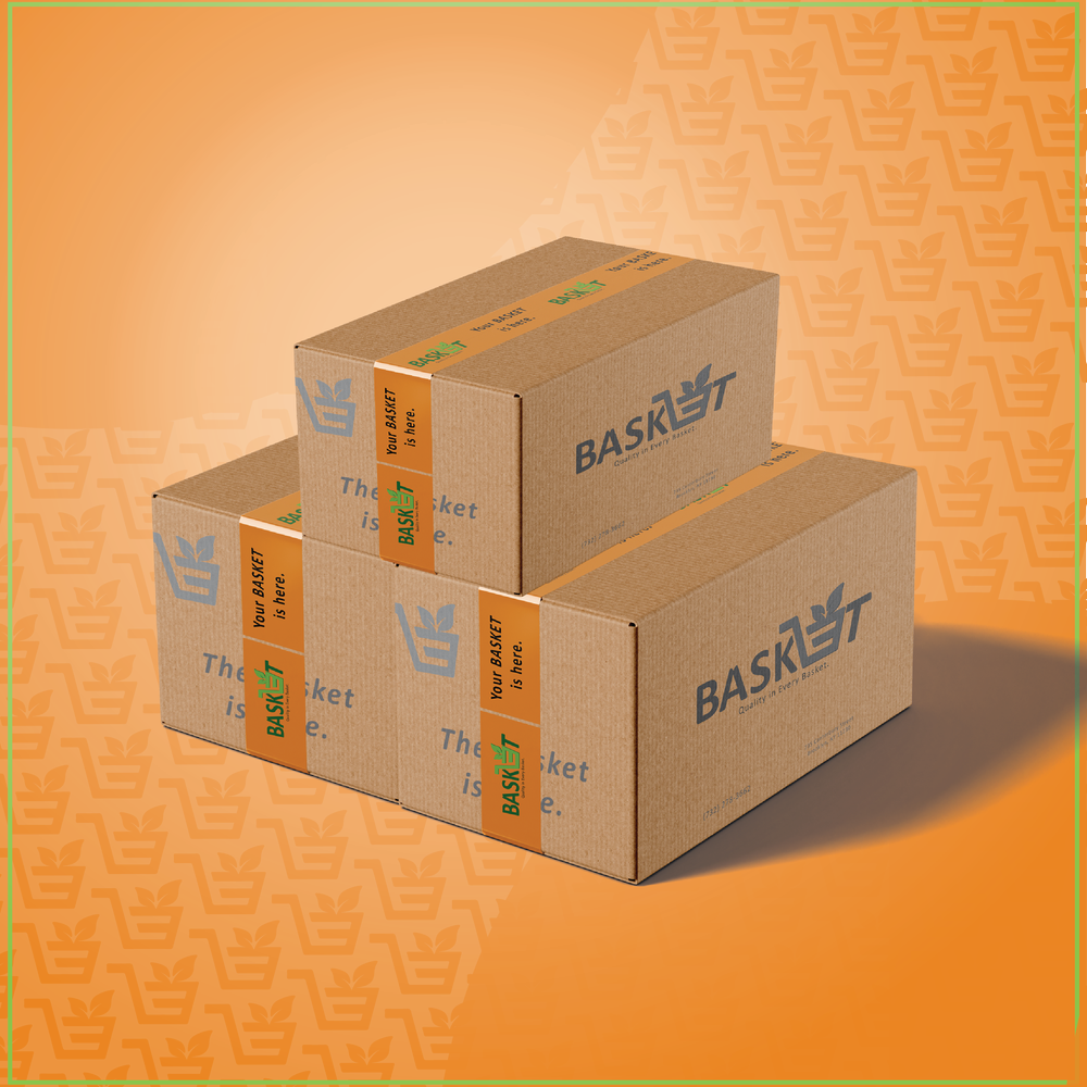 Three stacked cardboard boxes branded with the BASKET logo on orange.