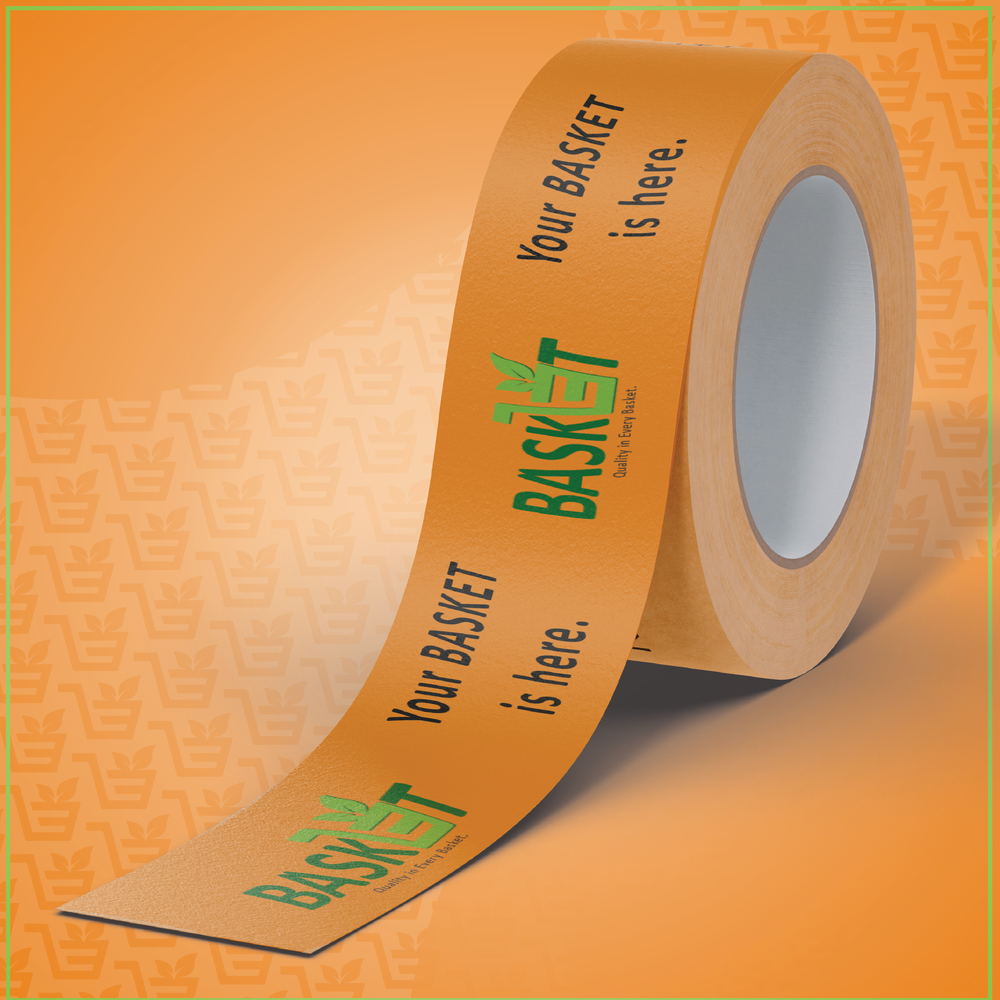 A roll of orange packing tape printed “Your BASKET is here” in green.