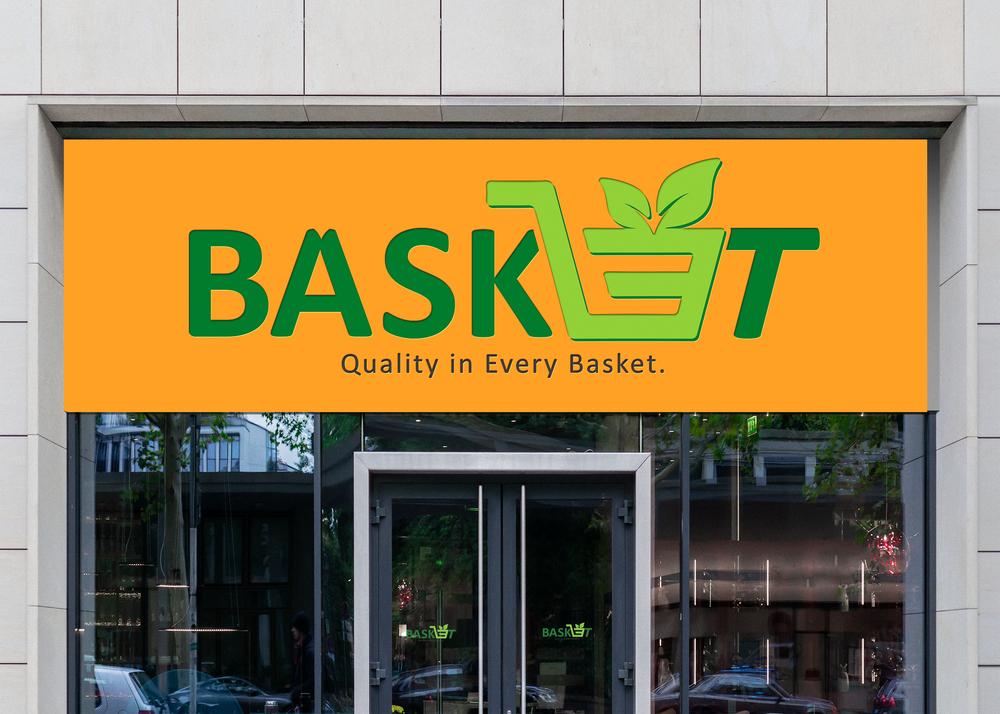 Storefront sign for Basket: orange background, green text, basket logo with leaves and the tagline “Quality in Every Basket.”