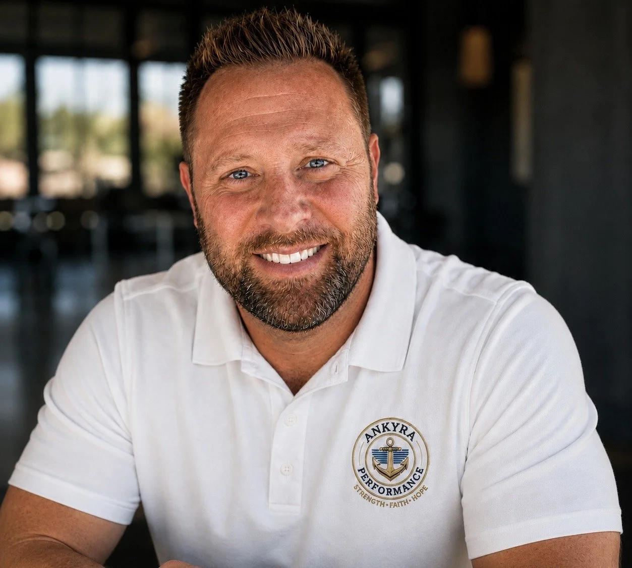 John Ricketts, founder of Ankyra Leadership Group, wearing an Ankyra Performance shirt.