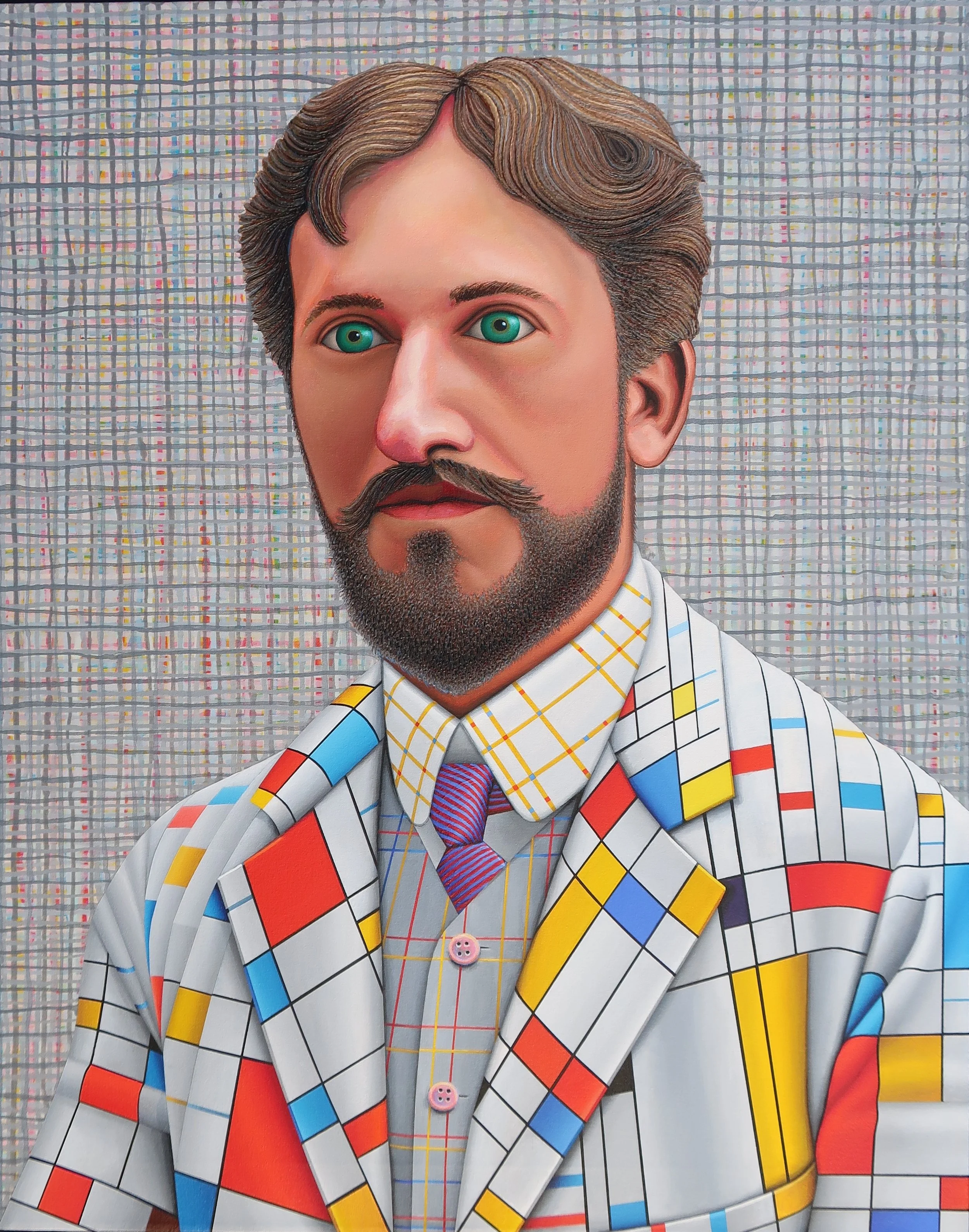 A man with a beard and mustache wearing a suit jacket and shirt with a colorful geometric pattern, standing against a textured, grid-like background.