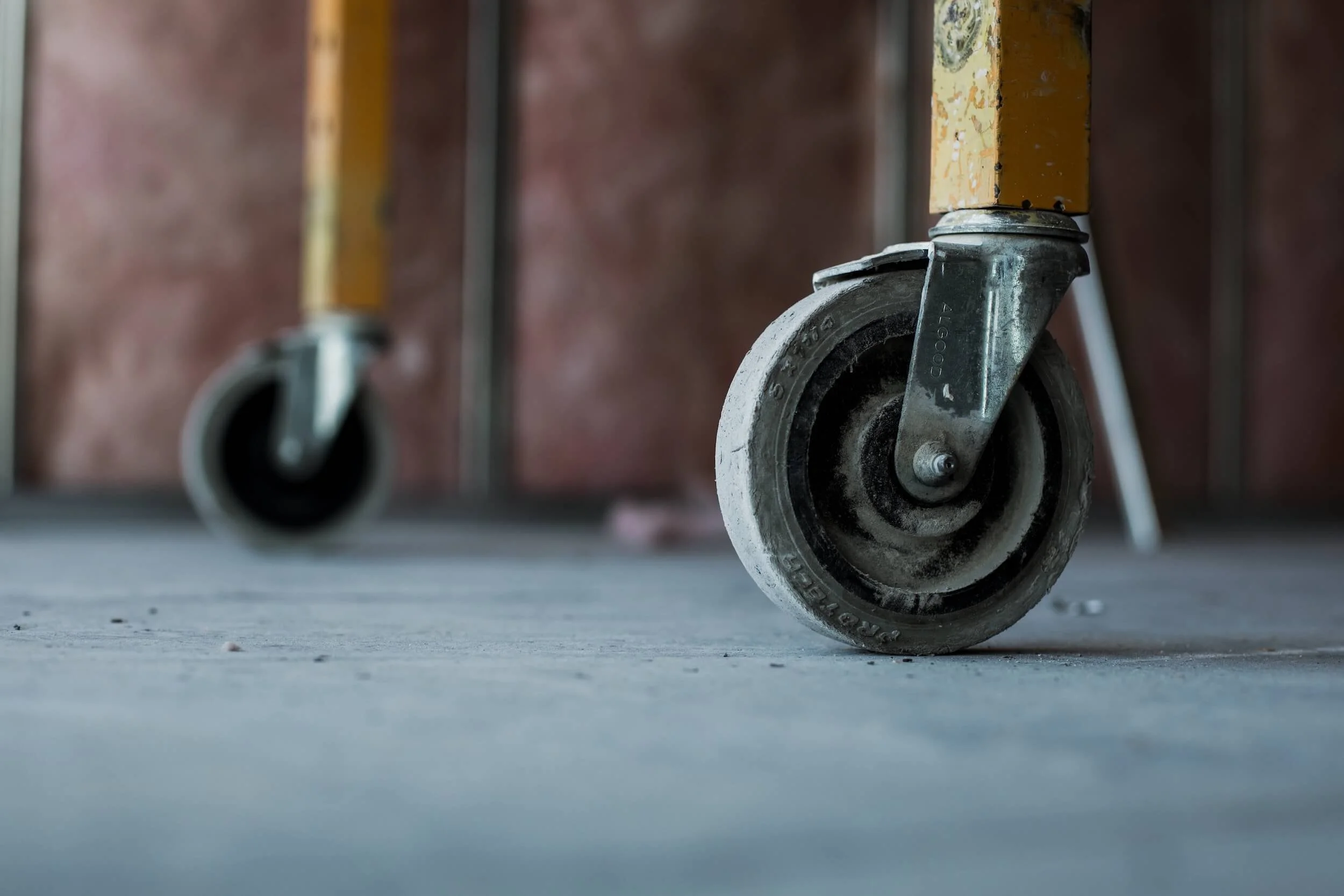 castor wheels on unfinished cement floor