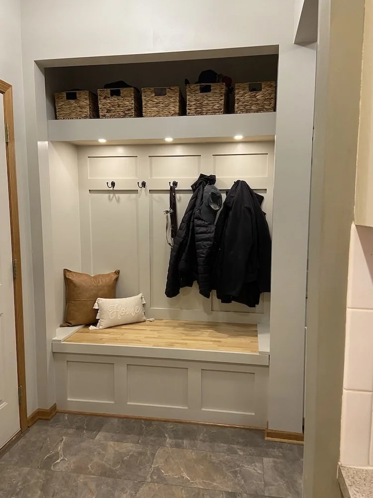 entryway bench with hooks and lighting