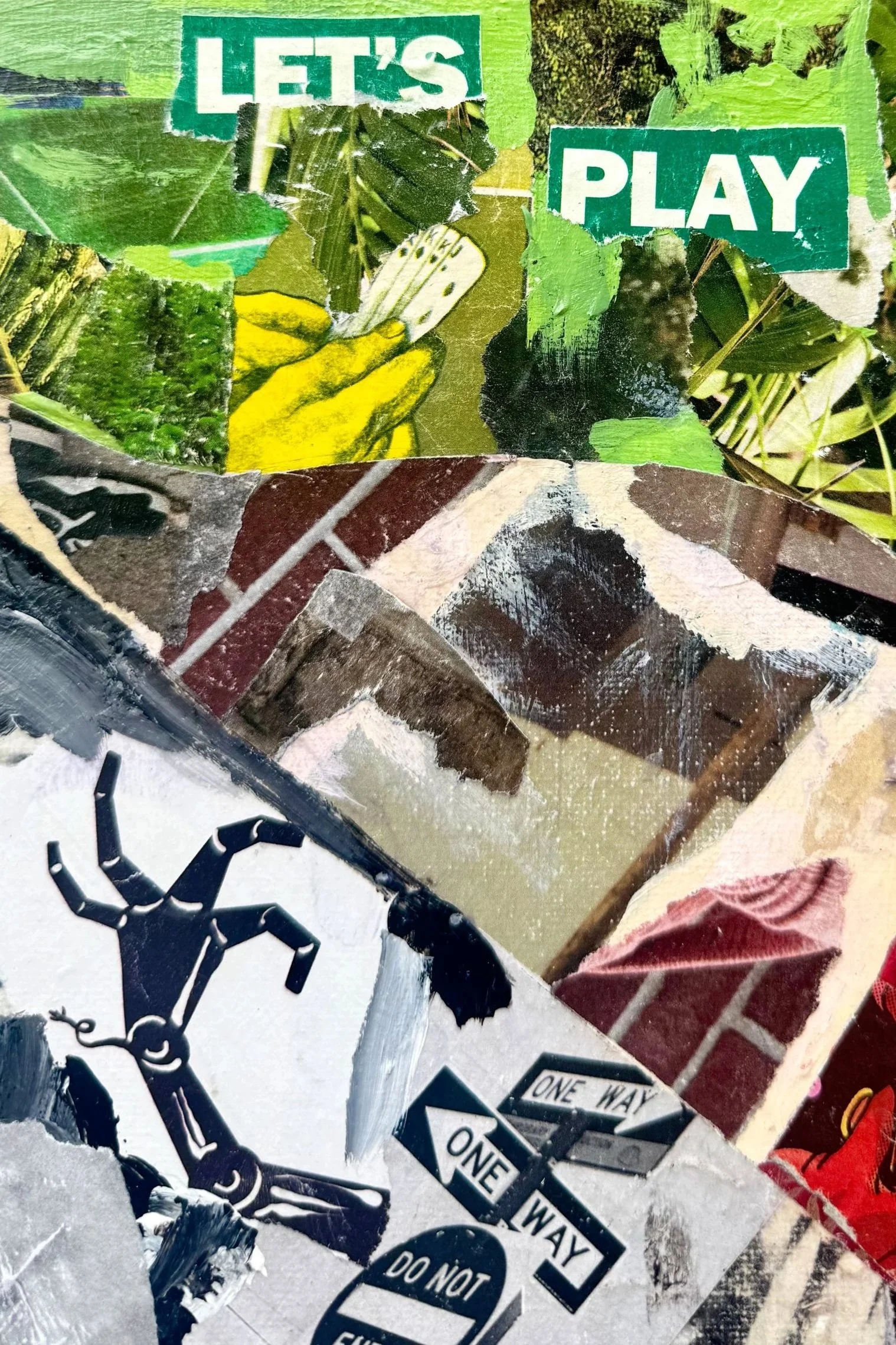 Collage of various stickers and cut-out images including a green and white sign reading 'LET'S PLAY,' a black robotic hand, multiple one-way street signs, and other abstract and nature-themed elements.