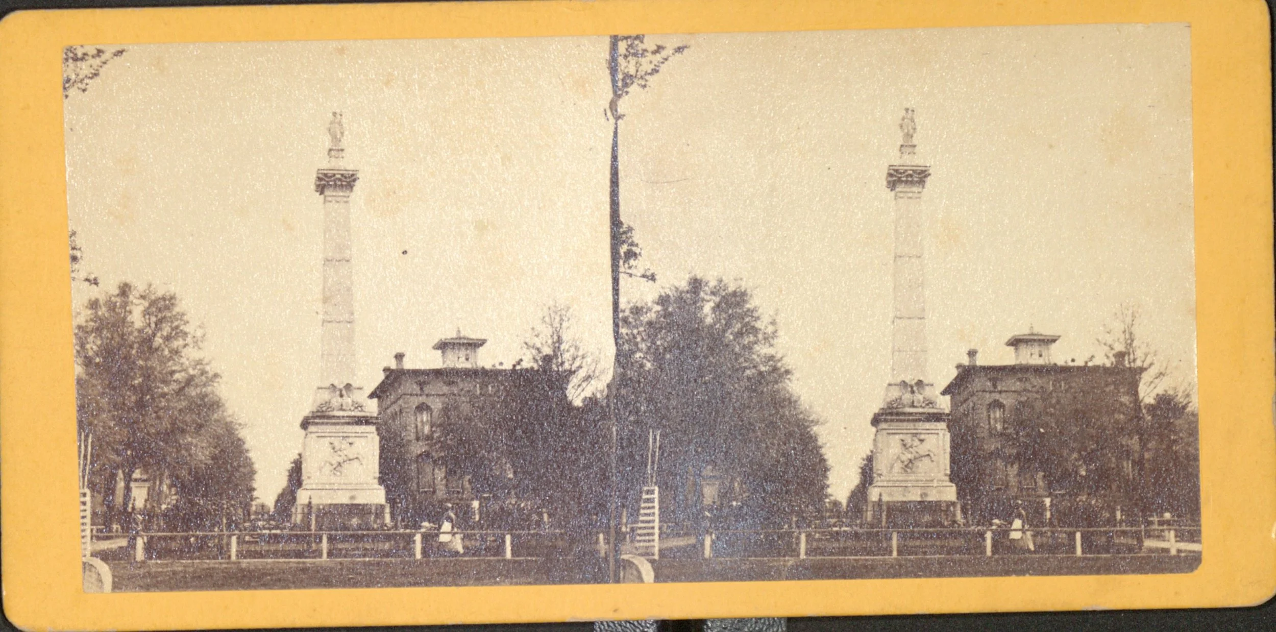 Stereoscopic view of the Pulaski Monument from the NYPL Robert N. Dennis collection of Stereoscopic views dated 1865. Noble Hardee House visible to the right of the Pulaski Monument.