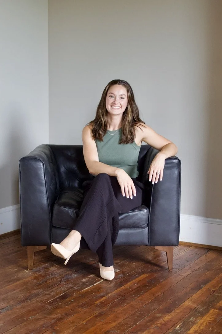 Brie Murdock, paralegal at Lighthouse Legal, smiling in the Statesville office